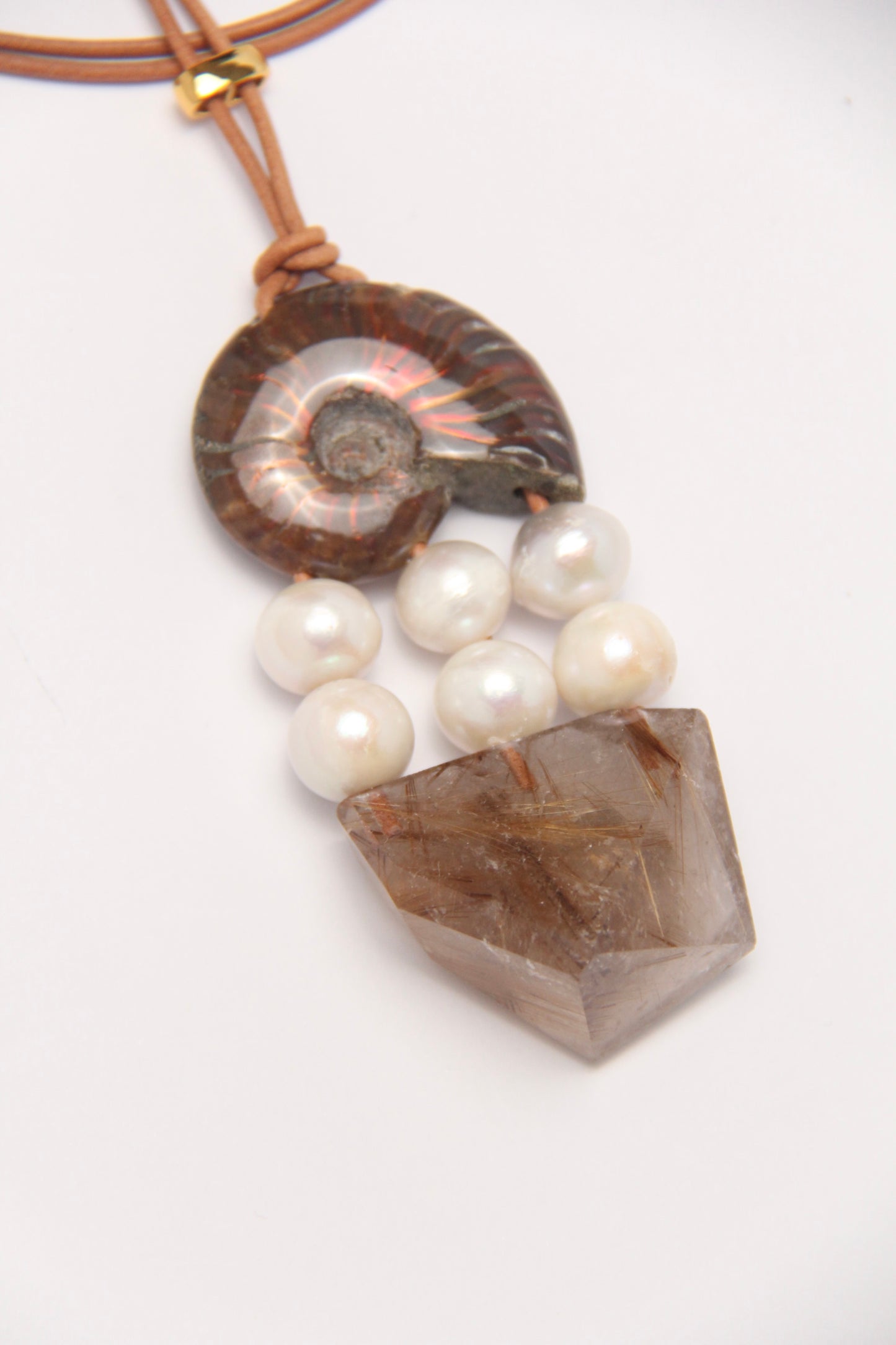 Pendant: ammonite, pearls, rutilated quartz