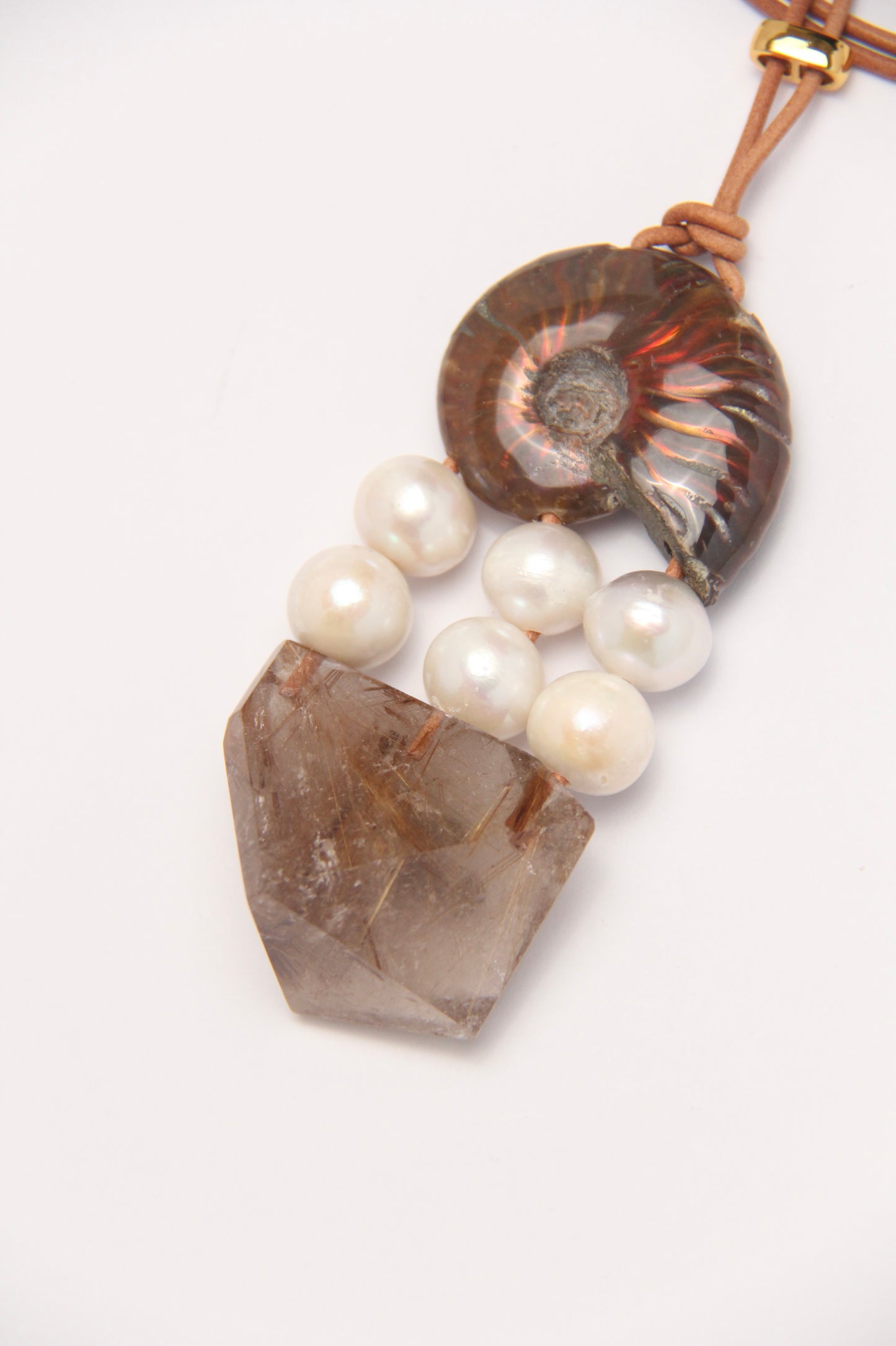 Pendant: ammonite, pearls, rutilated quartz