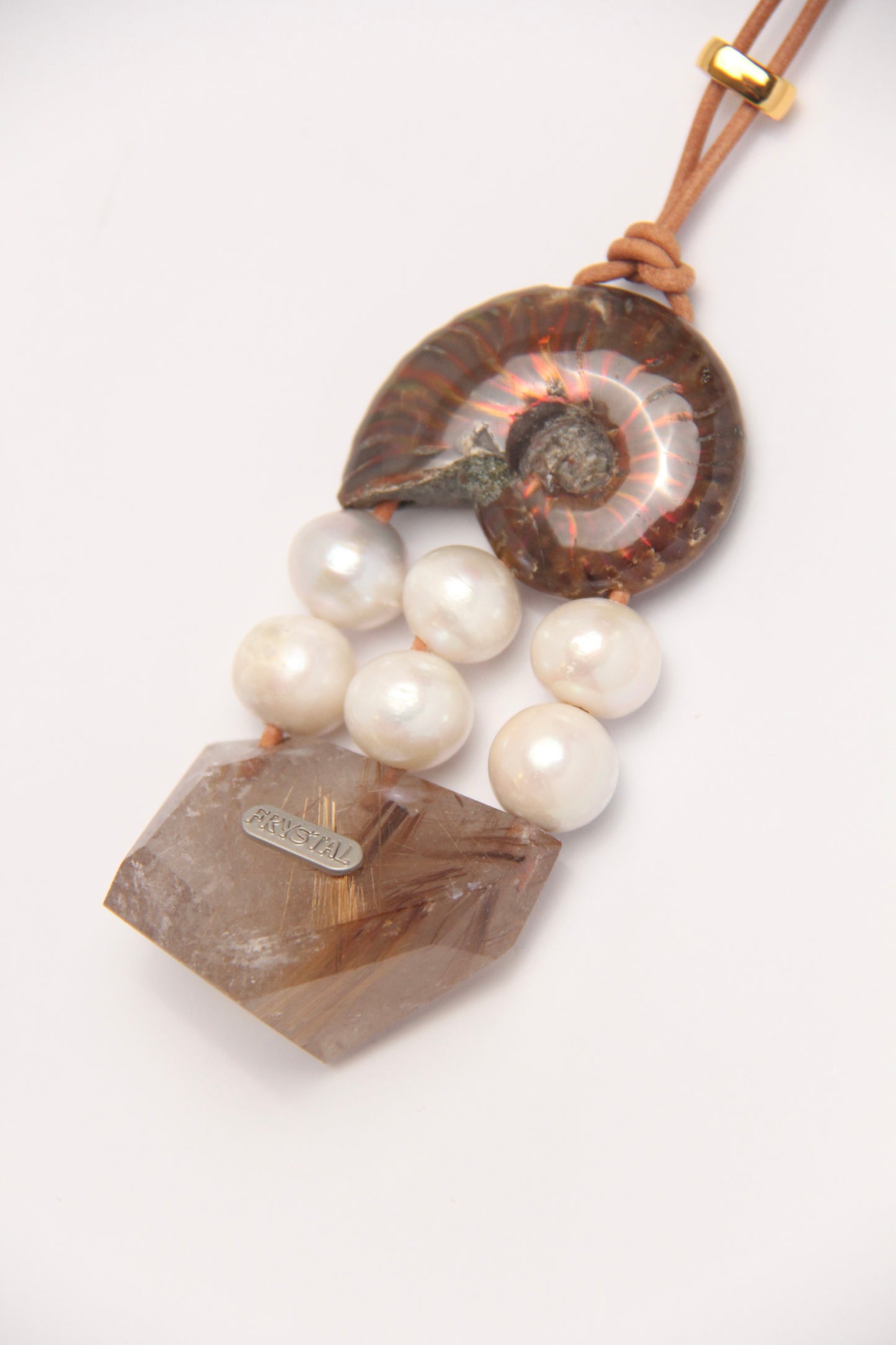 Pendant: ammonite, pearls, rutilated quartz