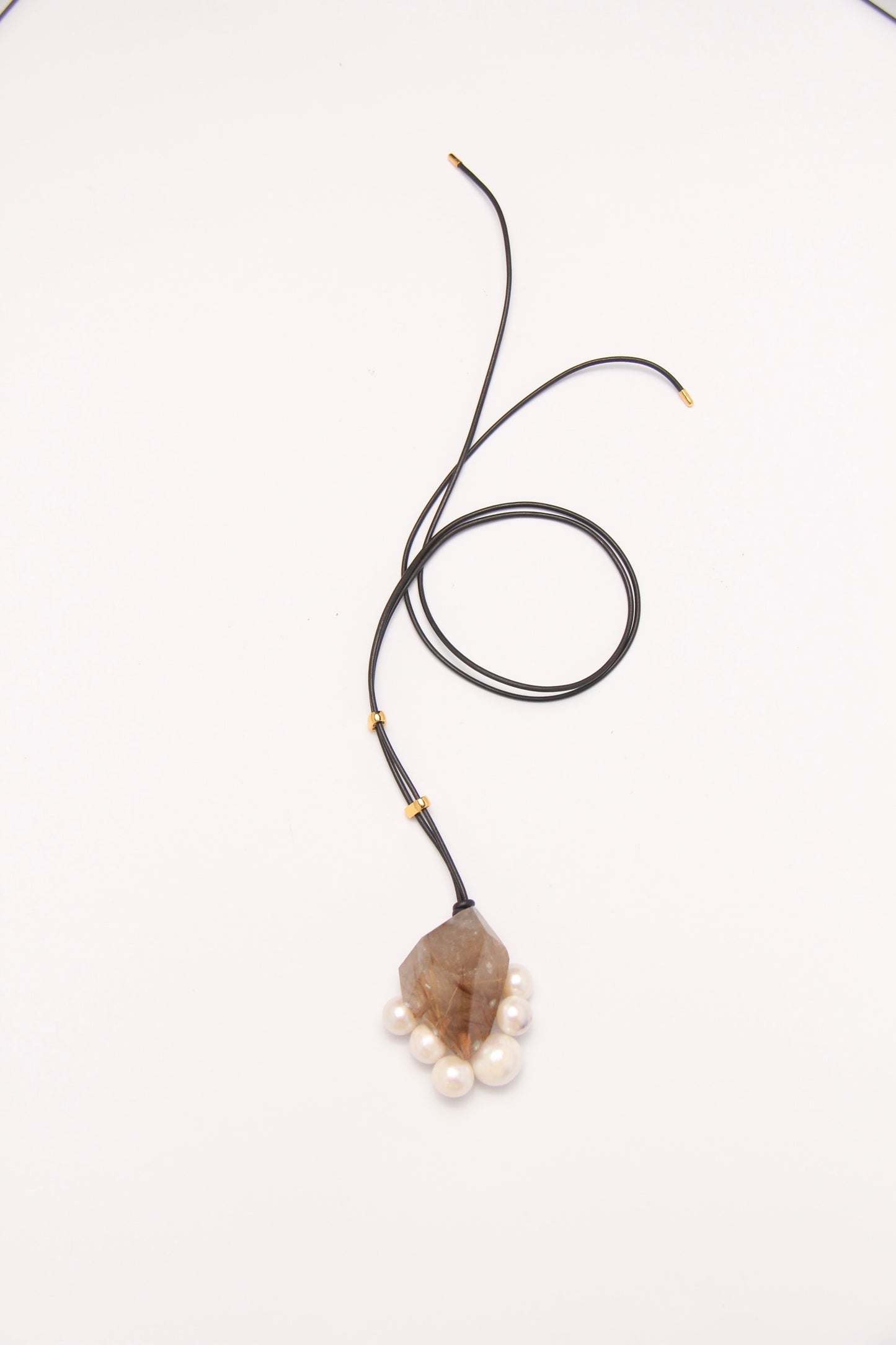 Pendant: rutilated quartz, pearls