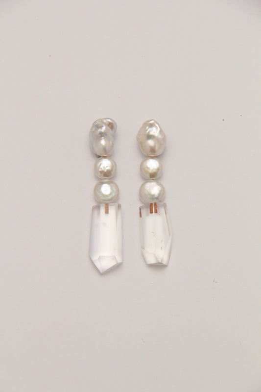Earrings: pearls, quartz