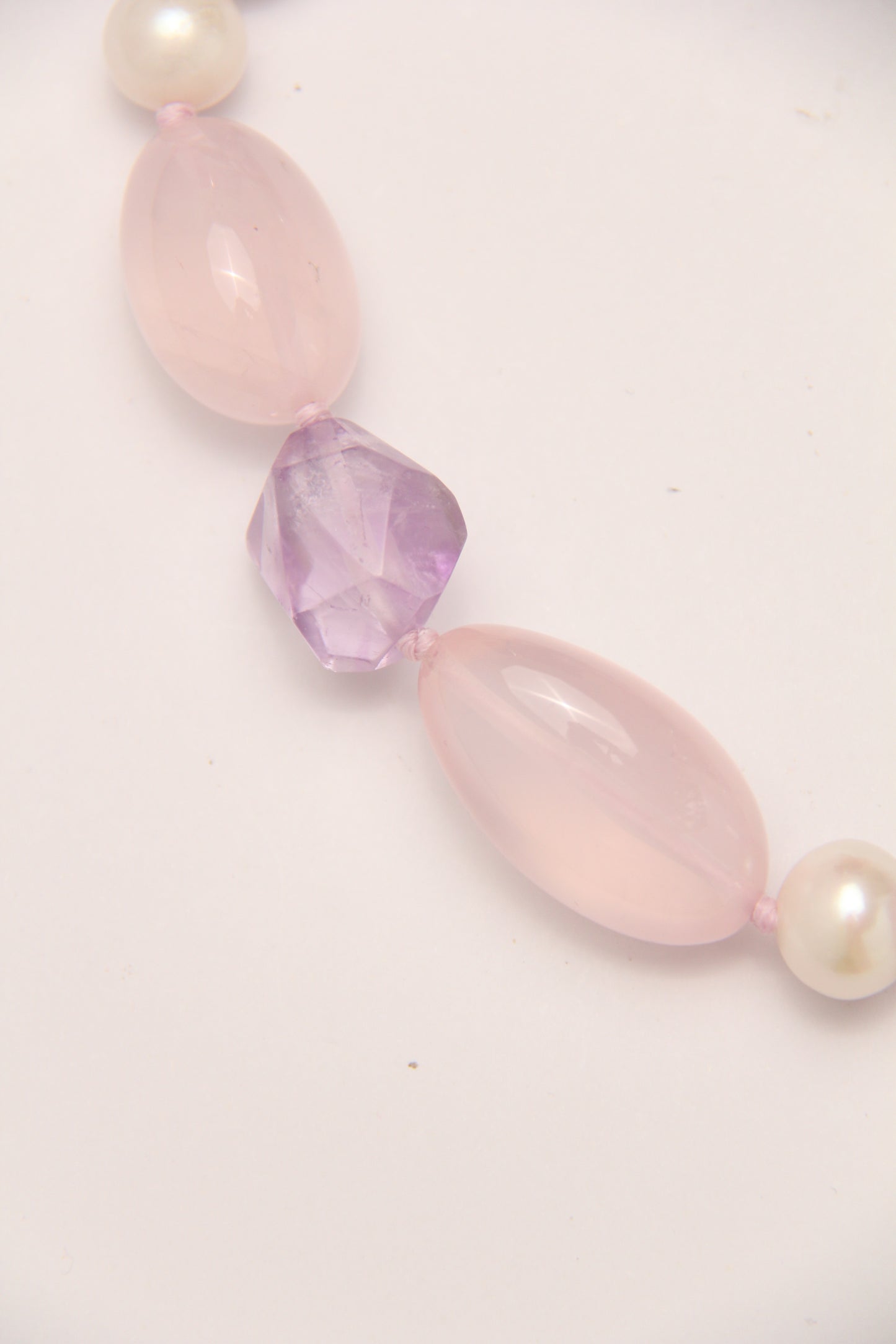 Necklace: pearls, rose quartz, amethyst, ebony