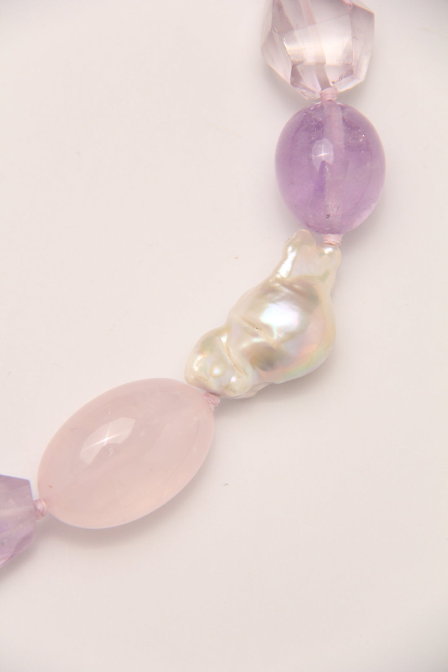 Necklace: pearls, rose quartz, amethyst, ebony