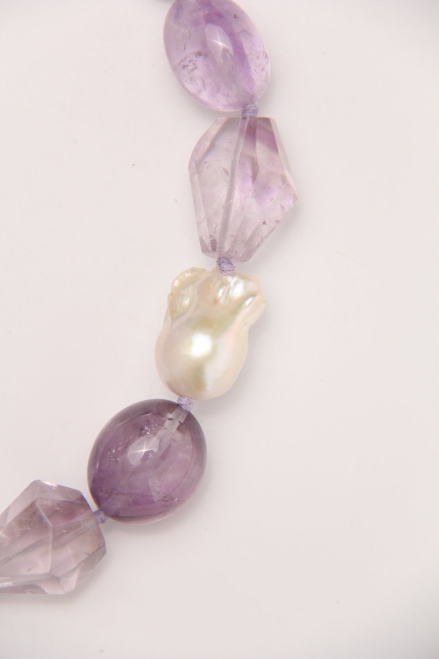 Necklace: pearls, amethyst, ebony