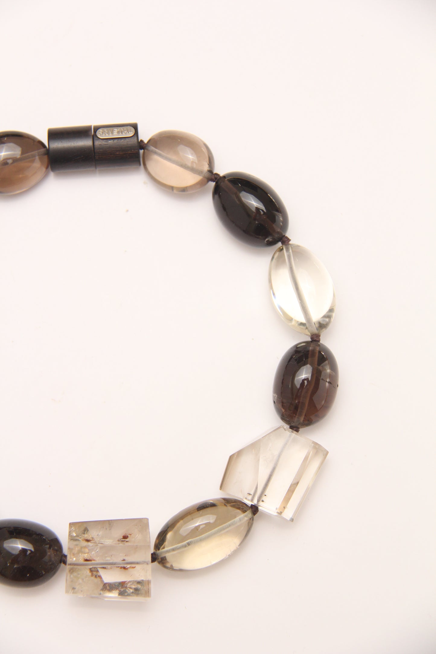 Pendant: smoky quartz, citrine, ebony