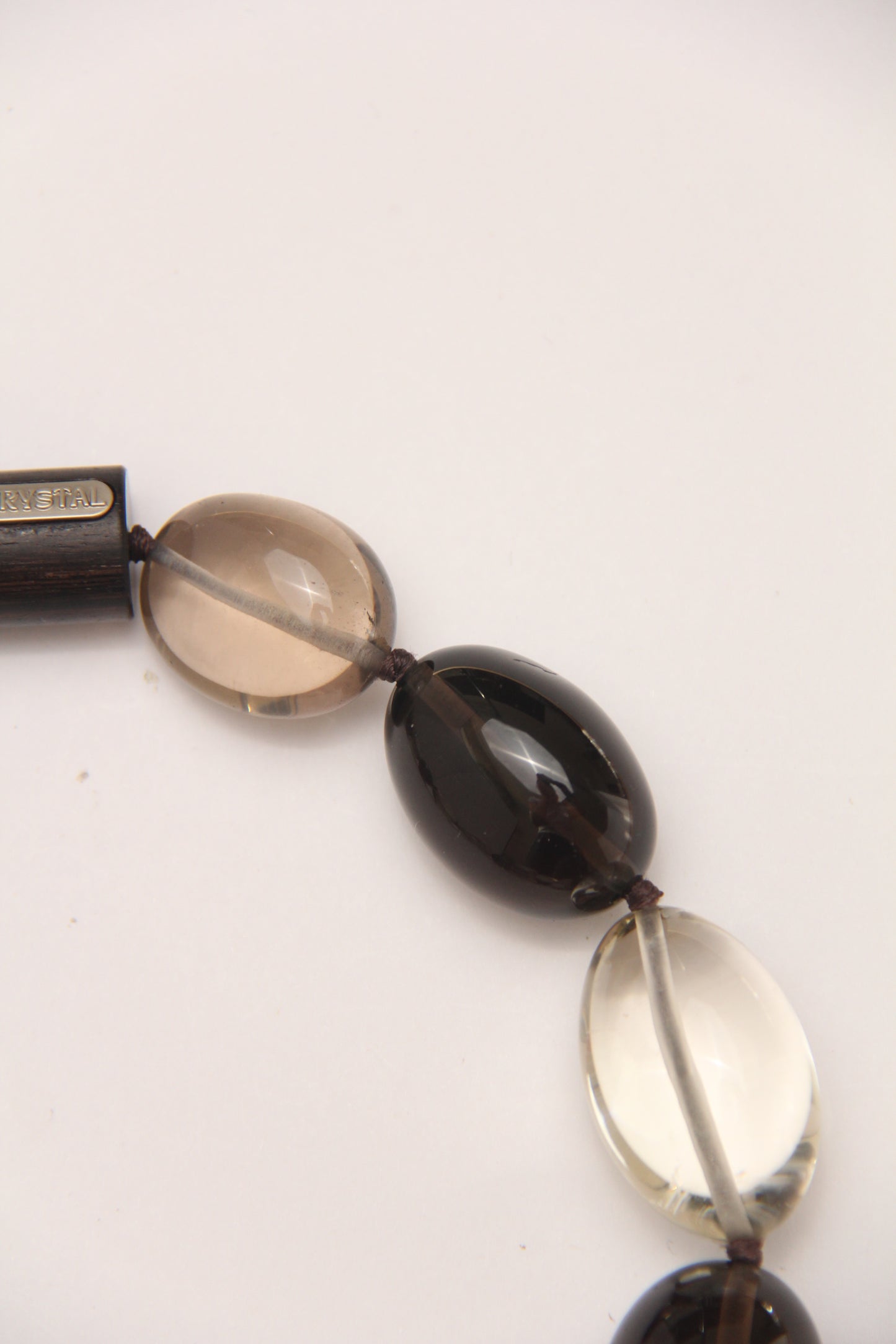 Pendant: smoky quartz, citrine, ebony