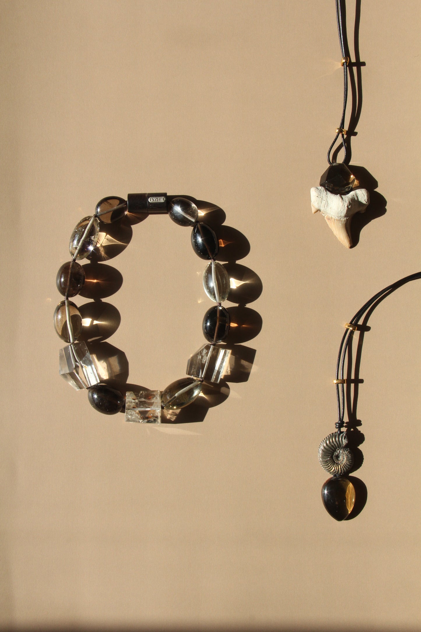 Pendant: smoky quartz, citrine, ebony