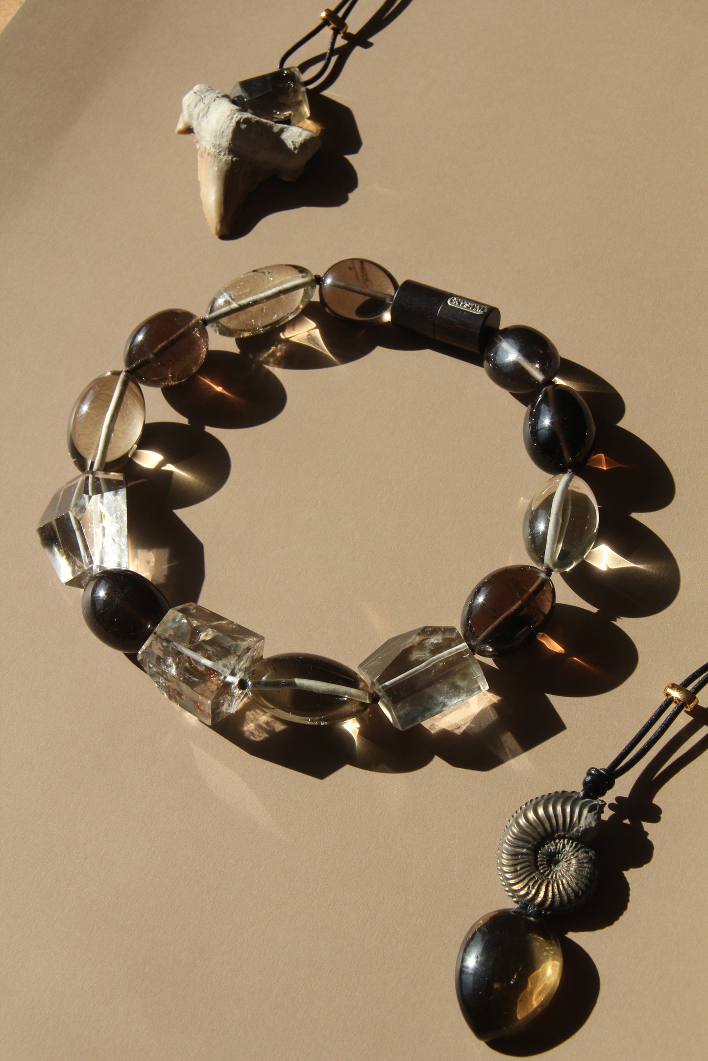 Pendant: smoky quartz, citrine, ebony