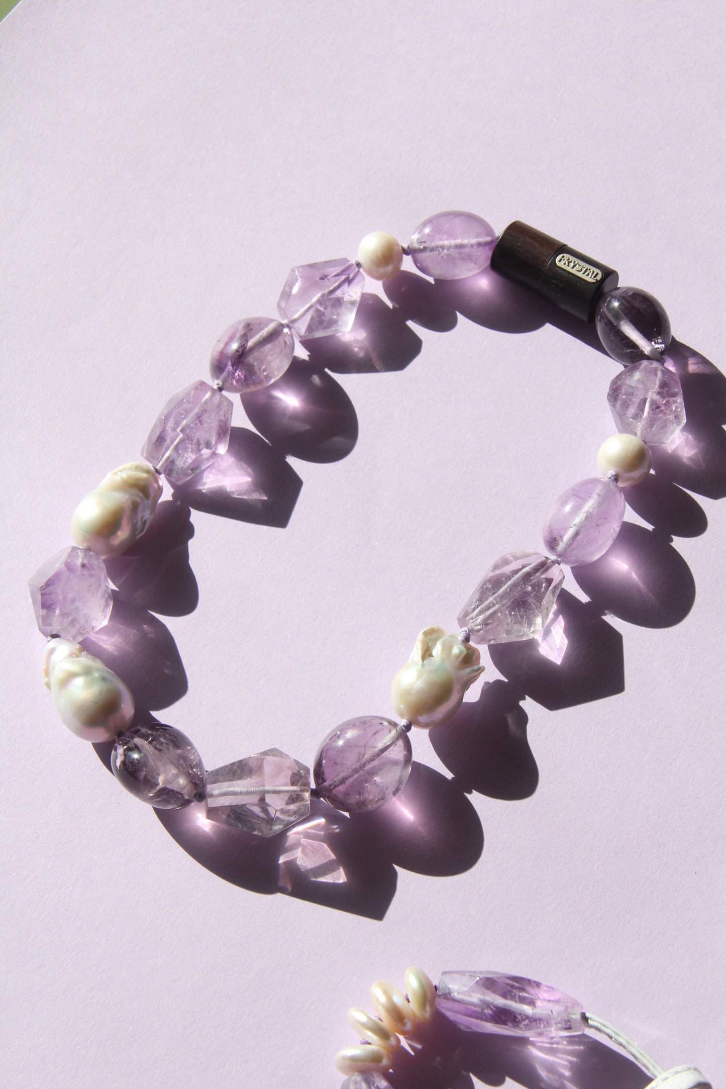 Necklace: pearls, amethyst, ebony