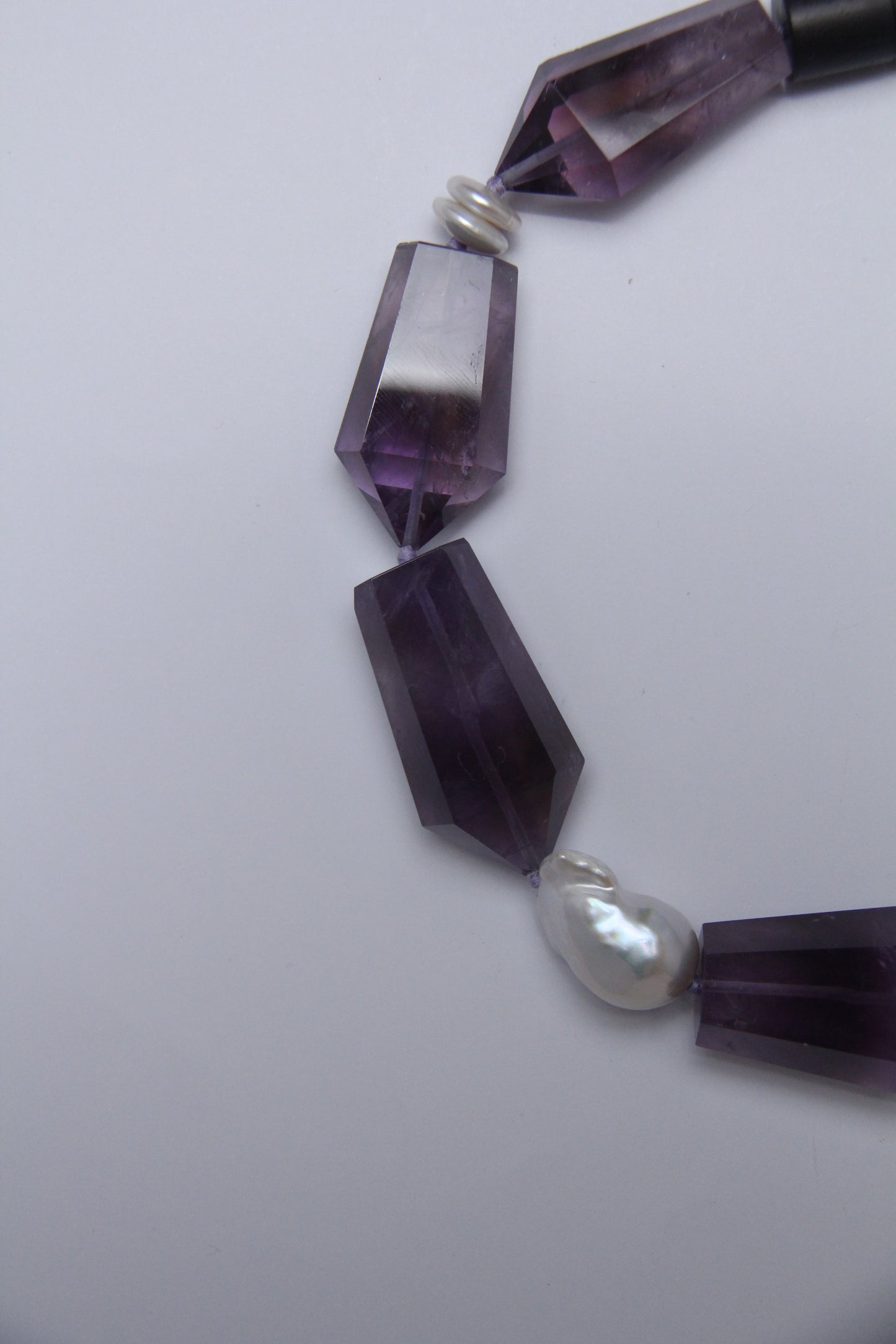 Necklace: pearls, amethyst, ebony