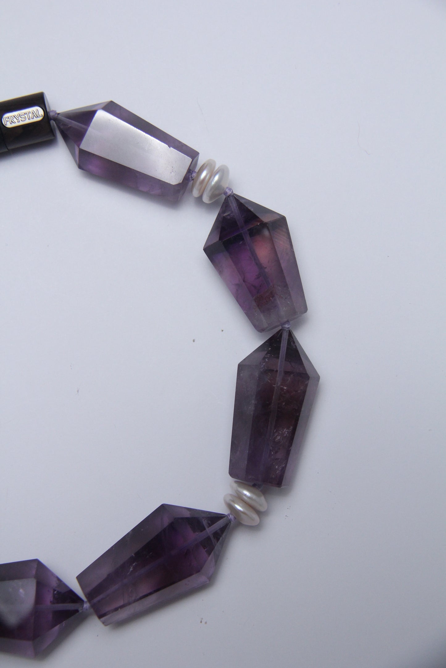 Necklace: pearls, amethyst, ebony