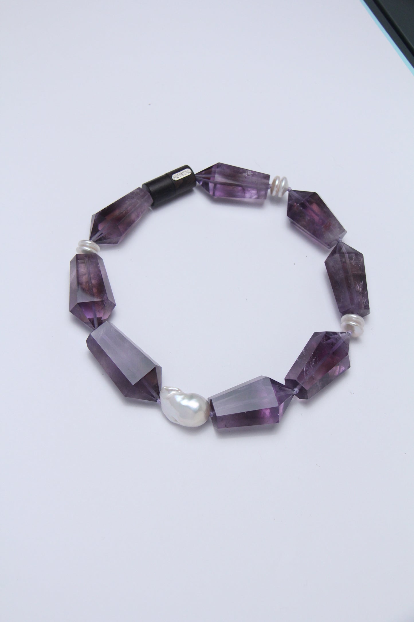 Necklace: pearls, amethyst, ebony