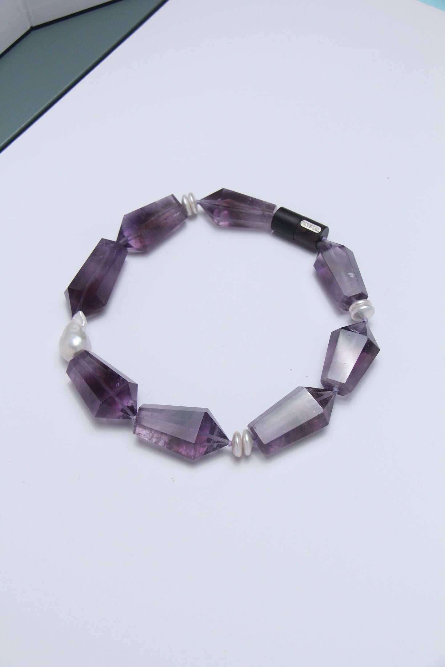Necklace: pearls, amethyst, ebony