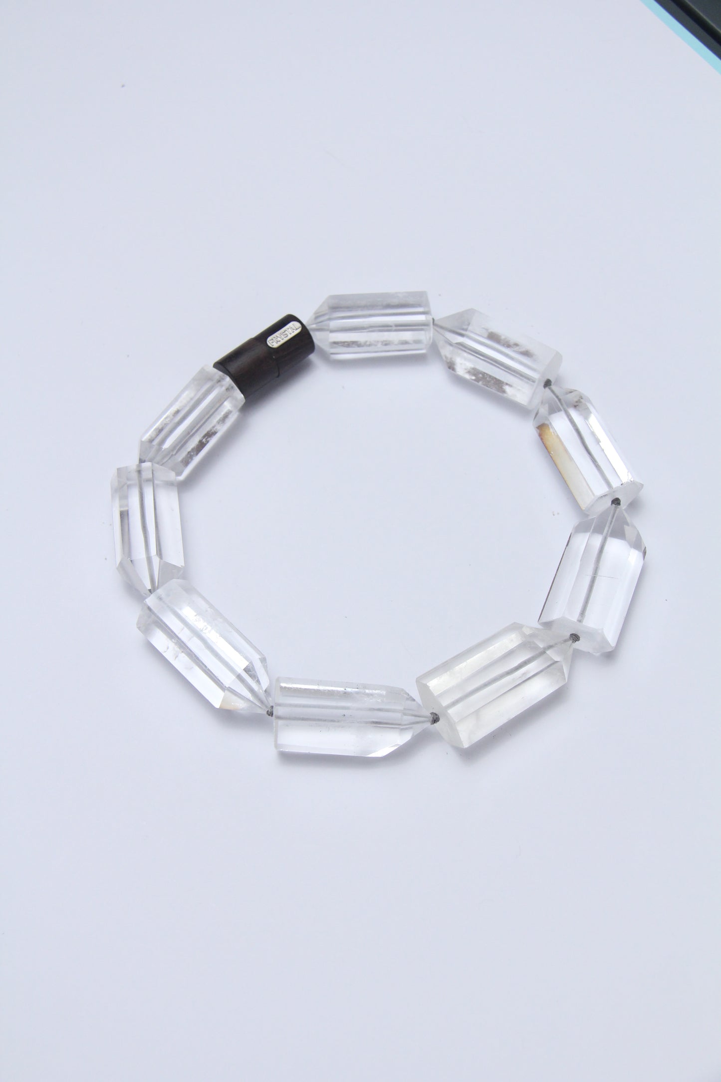 Necklace: quartz, ebony