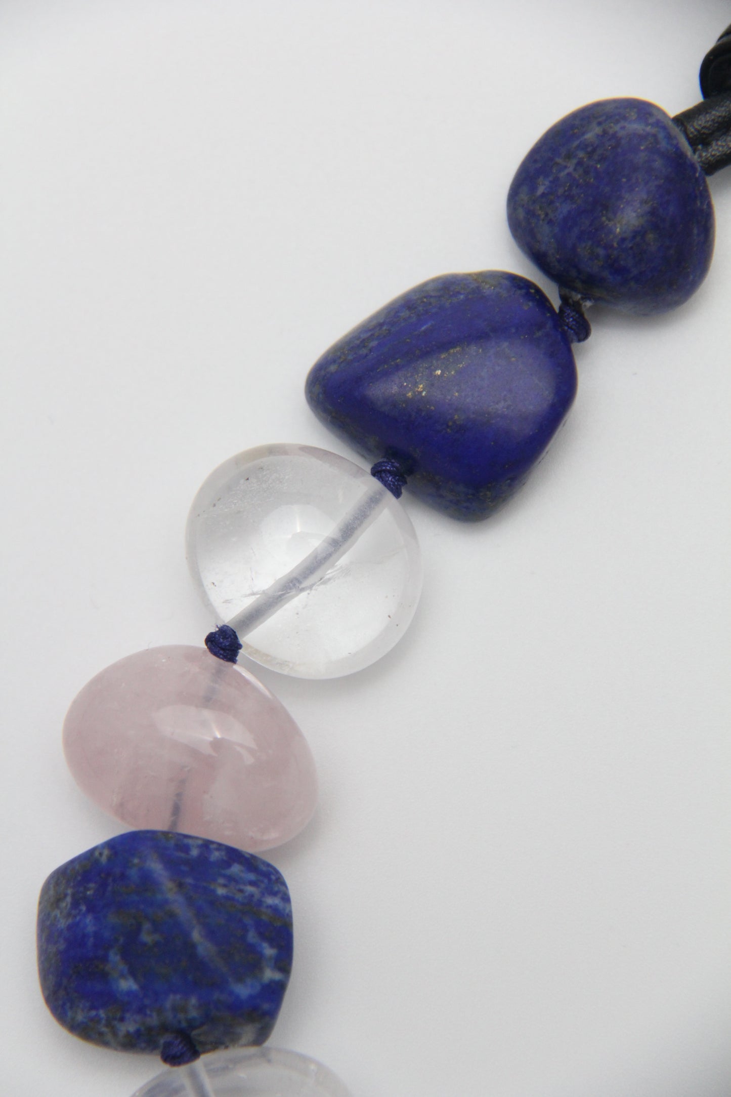 Necklace: Kyanite, lapis lazuli, rose quartz, pearl, white crystal