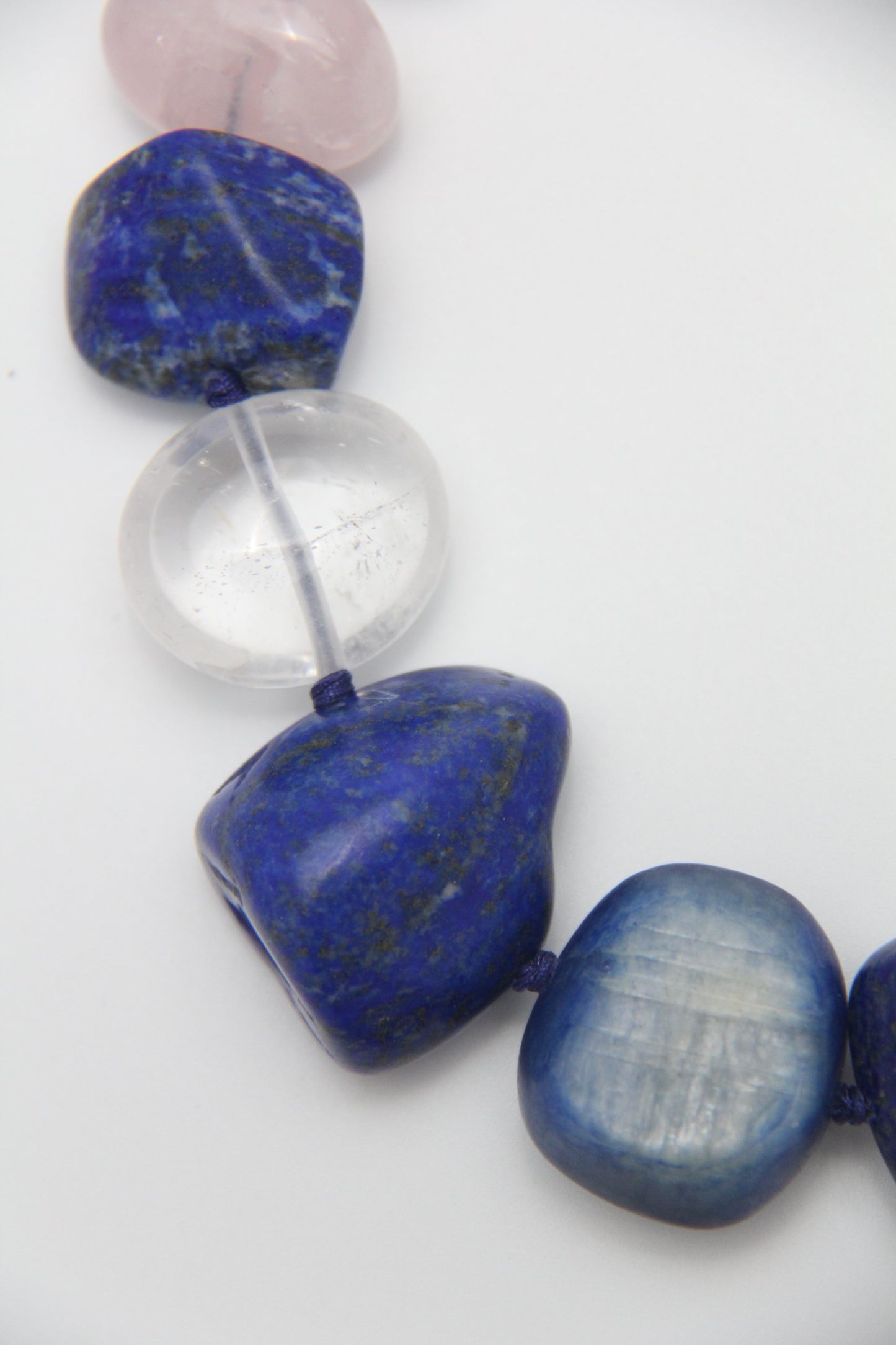 Necklace: Kyanite, lapis lazuli, rose quartz, pearl, white crystal