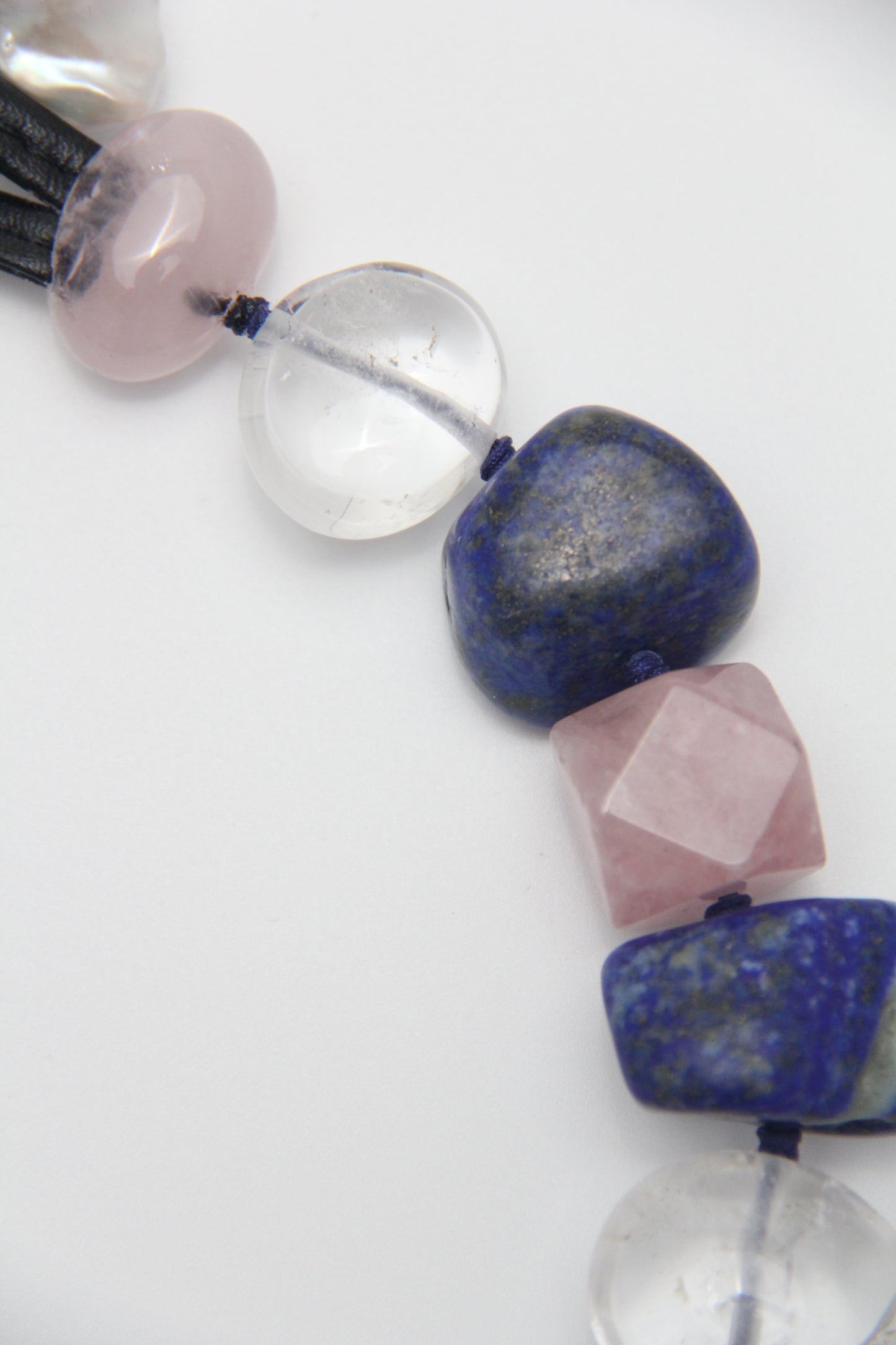 Necklace: Kyanite, lapis lazuli, rose quartz, pearl, white crystal