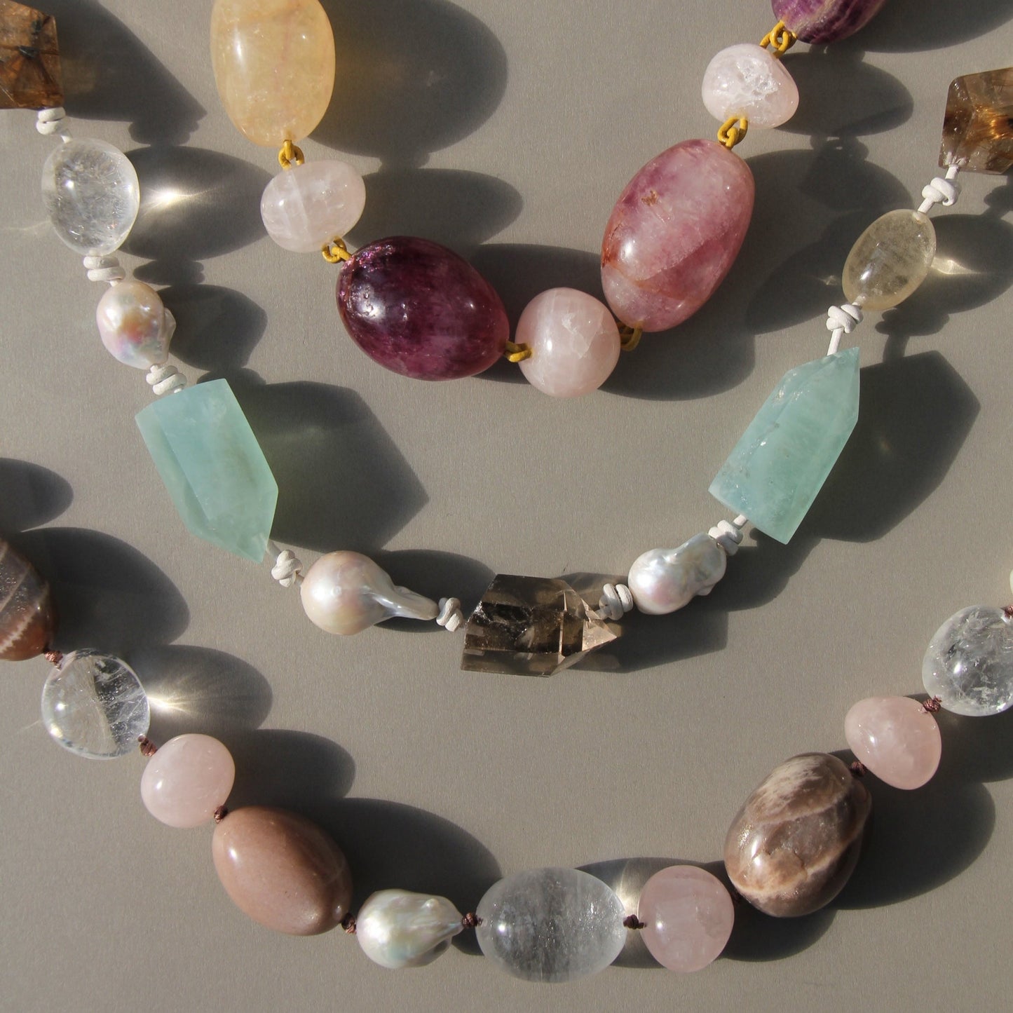 Necklace: golden hair rutilated quartz, aquamarine, pearls, smoky quartz, white crystal