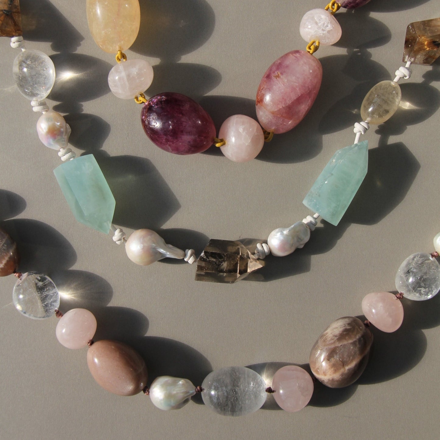 Necklace: fluorite, rose quartz, white crystal, pearl