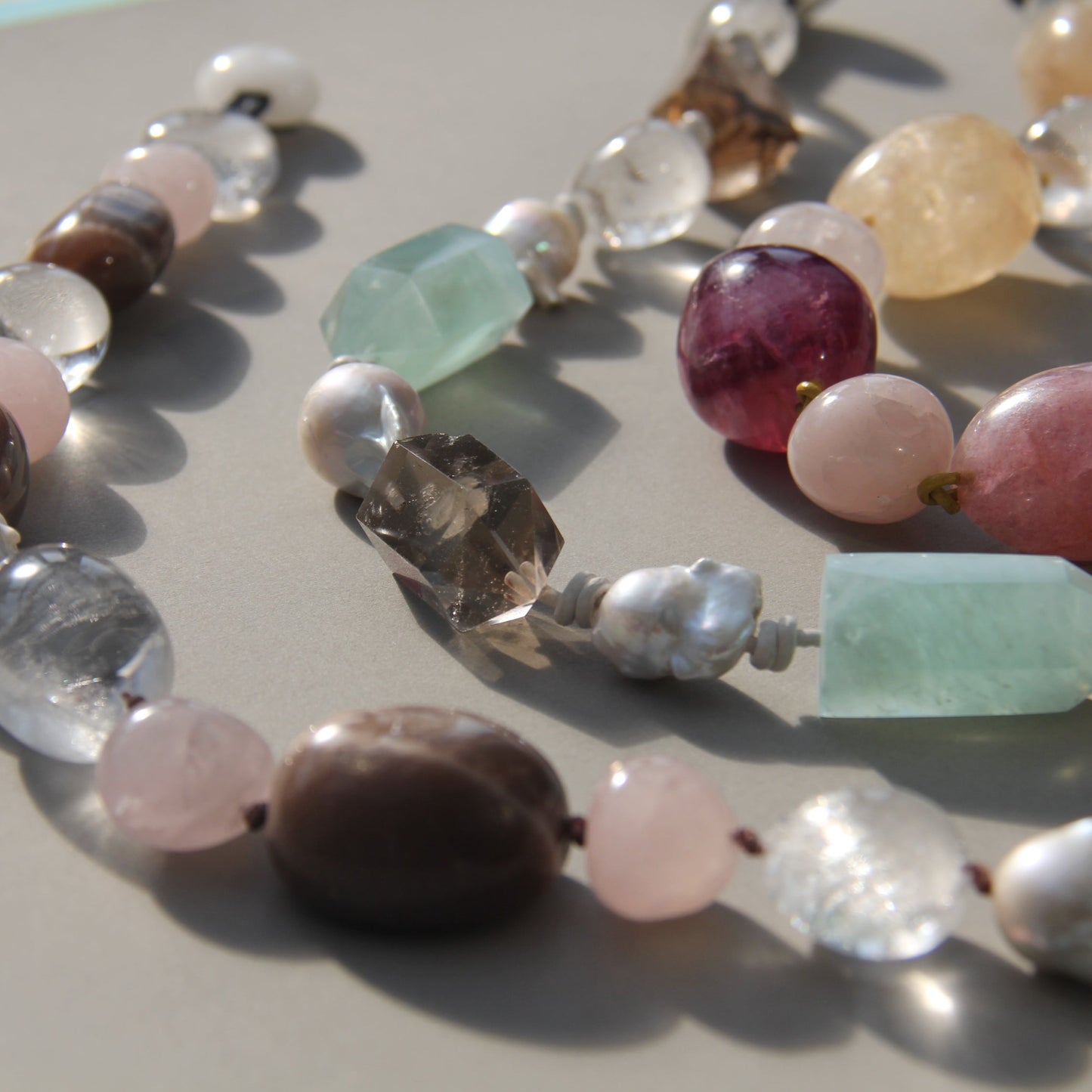 Necklace: golden hair rutilated quartz, aquamarine, pearls, smoky quartz, white crystal