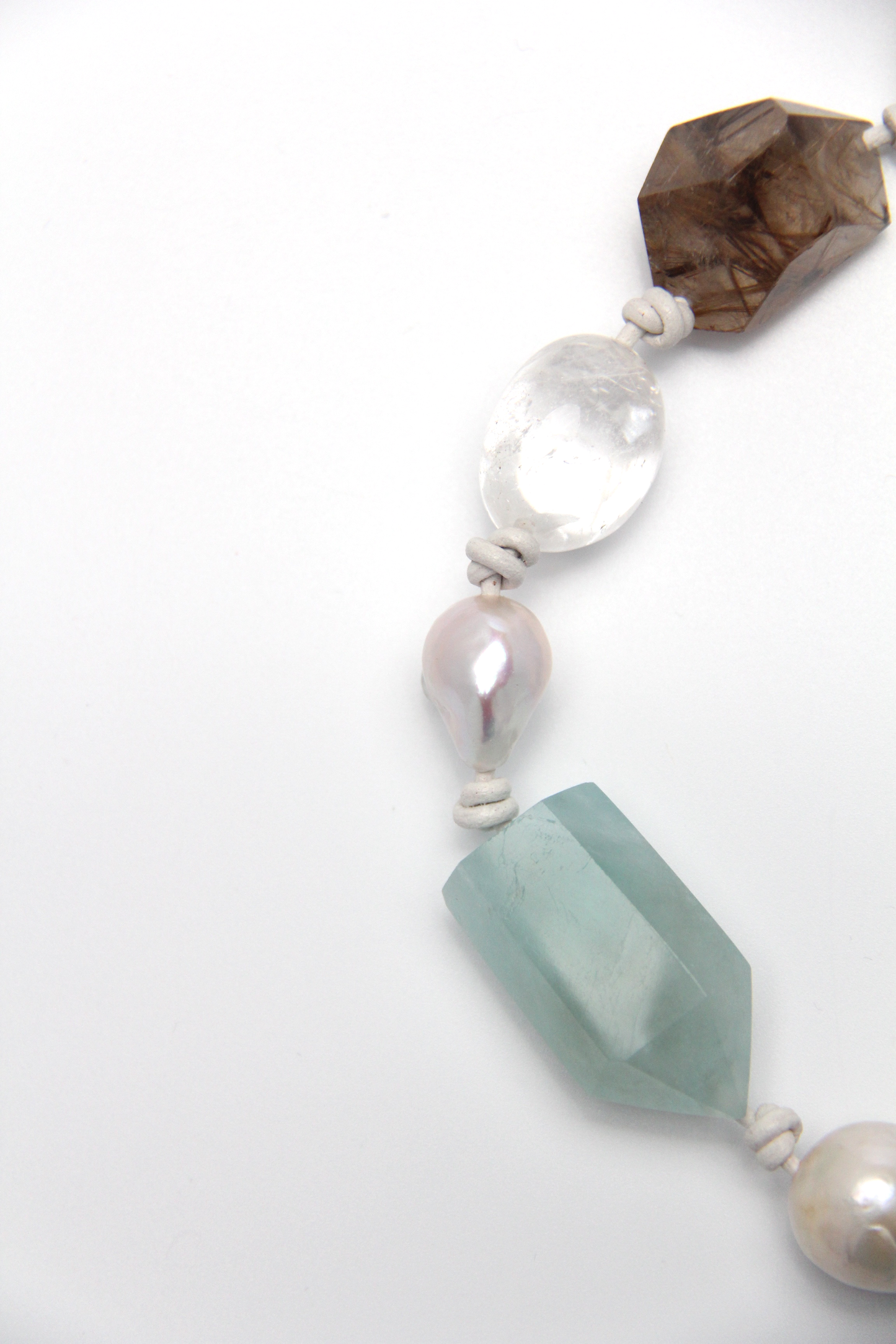 Necklace: golden hair rutilated quartz, aquamarine, pearls, smoky quartz, white crystal