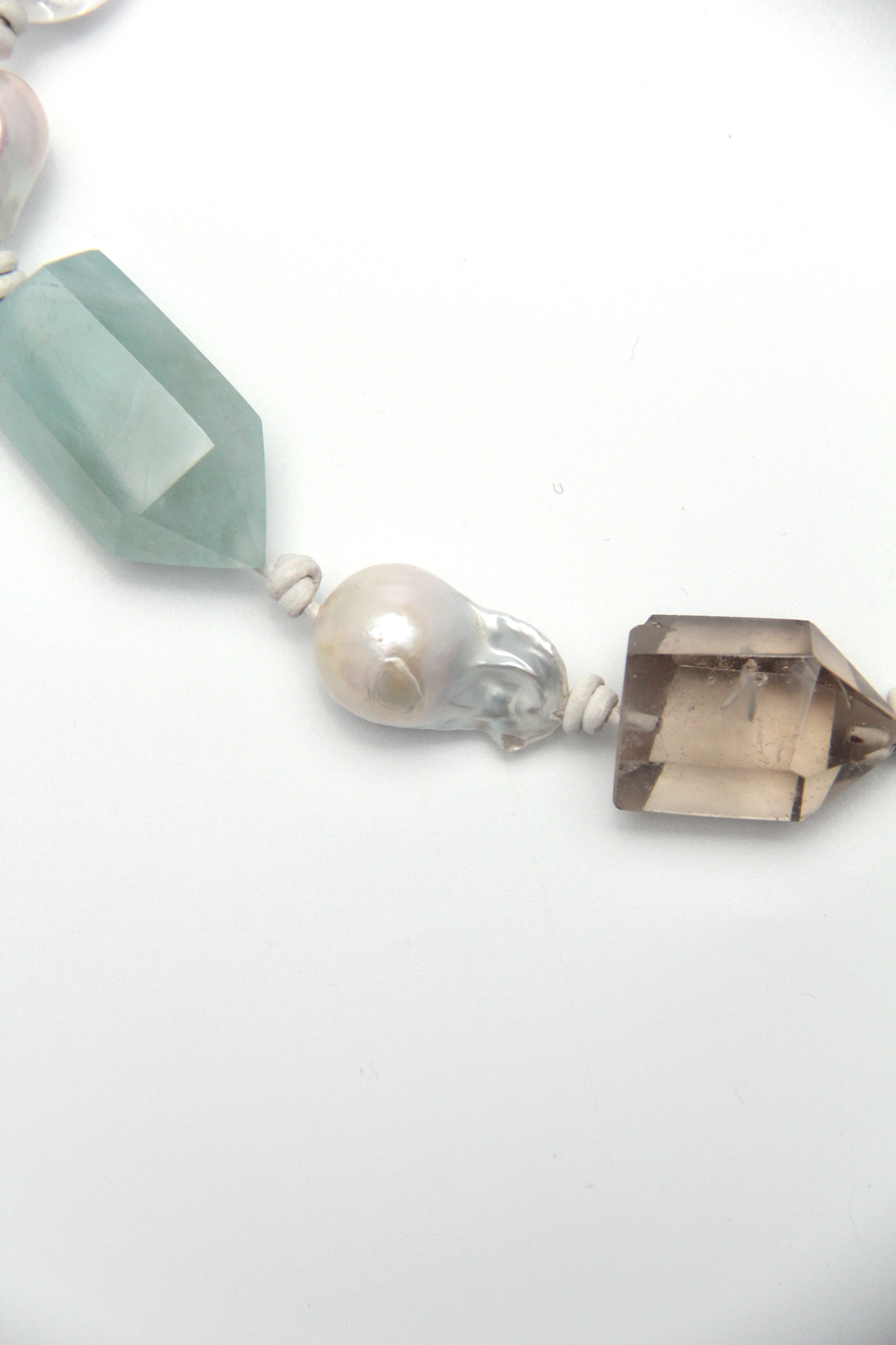 Necklace: golden hair rutilated quartz, aquamarine, pearls, smoky quartz, white crystal