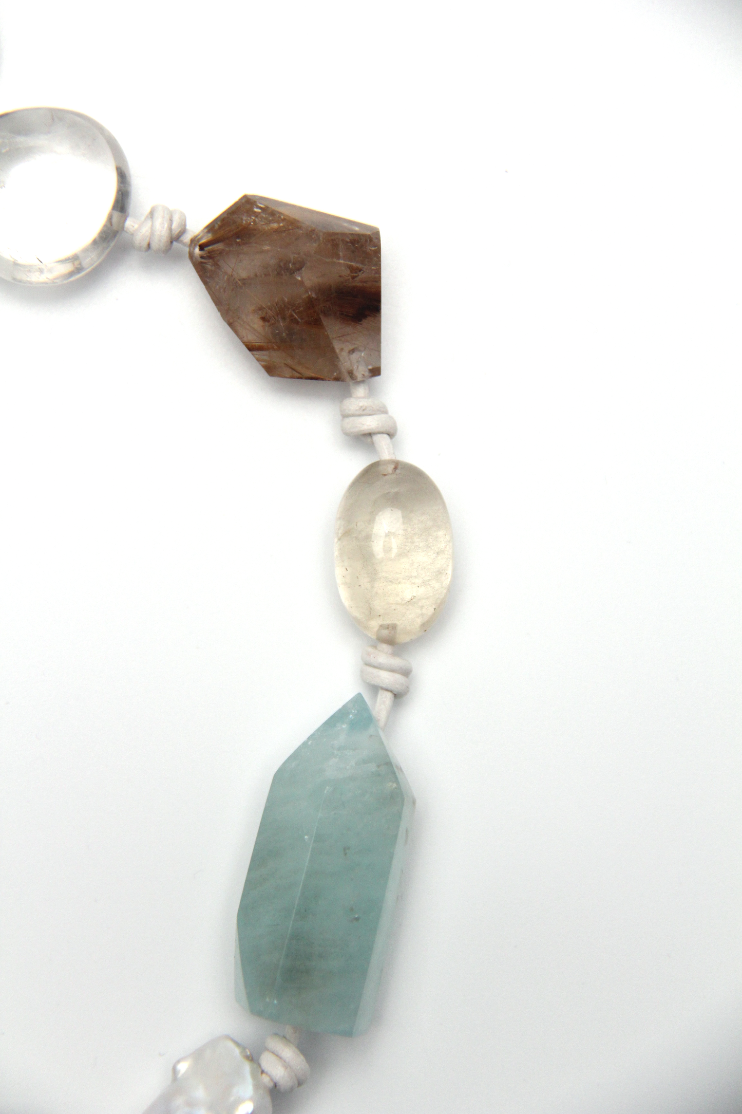 Necklace: golden hair rutilated quartz, aquamarine, pearls, smoky quartz, white crystal