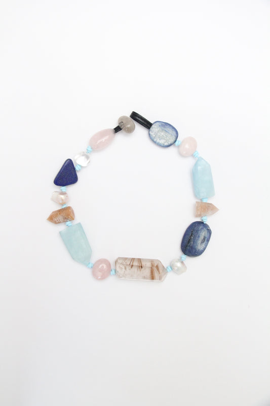 Necklace: golden hair rutilated quartz, aquamarine, kyanite, lapis lazuli, rose quartz, pearl, ghost quartz, white crystal, smoky quartz