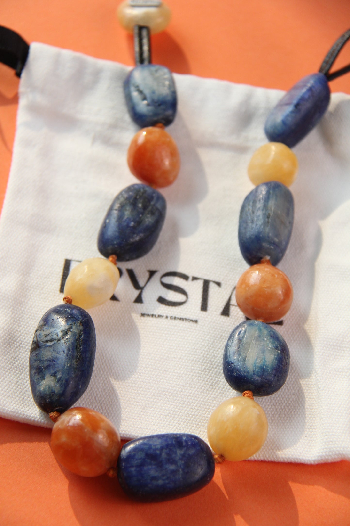 Necklacae: kyanite, calcite, cream yellow onyx