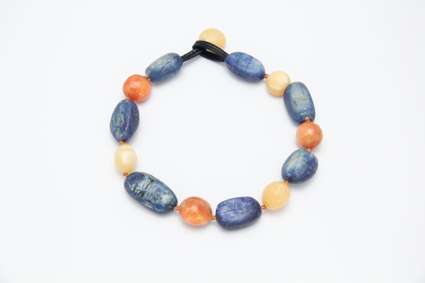 Necklacae: kyanite, calcite, cream yellow onyx