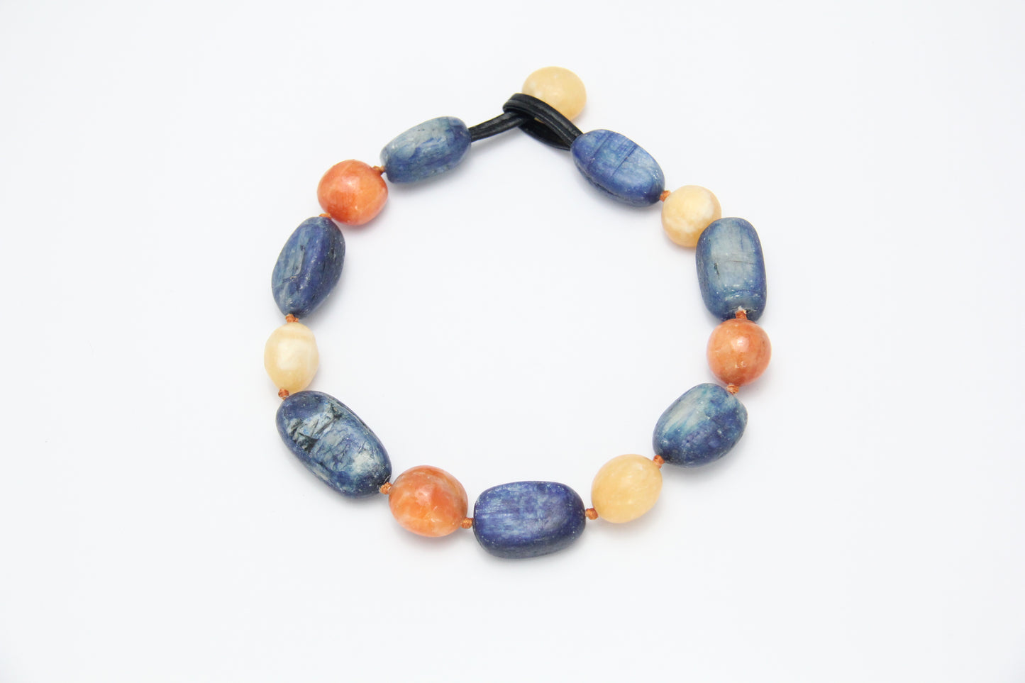 Necklacae: kyanite, calcite, cream yellow onyx