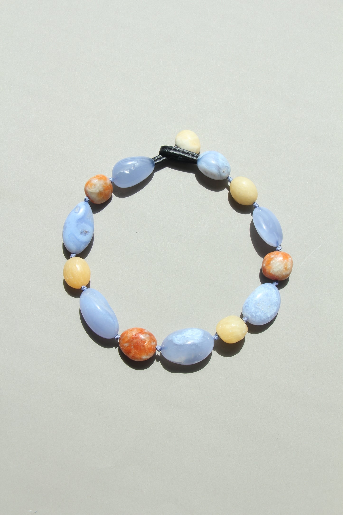 Necklace: blue lace agate, calcite, cream yellow onyx