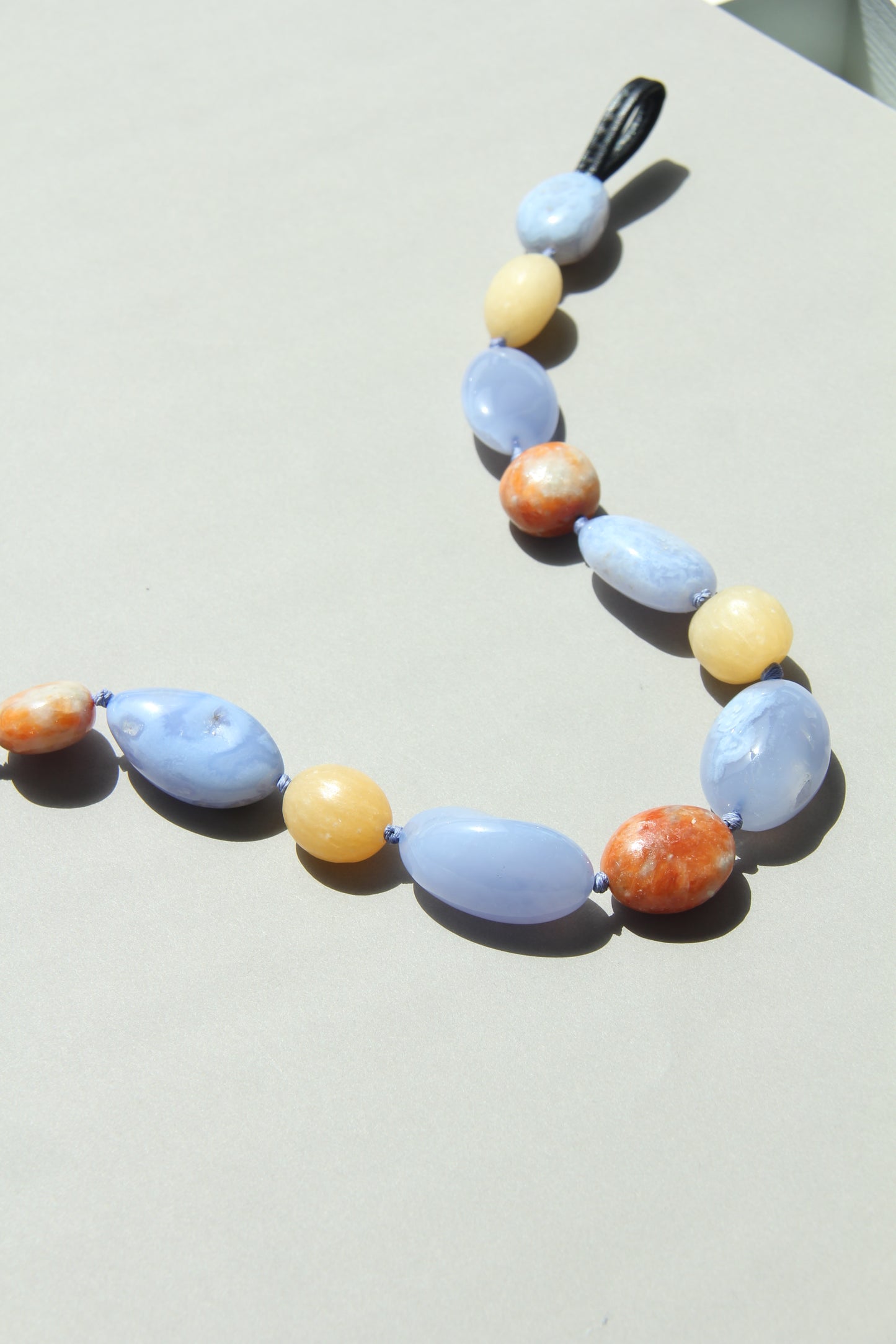 Necklace: blue lace agate, calcite, cream yellow onyx