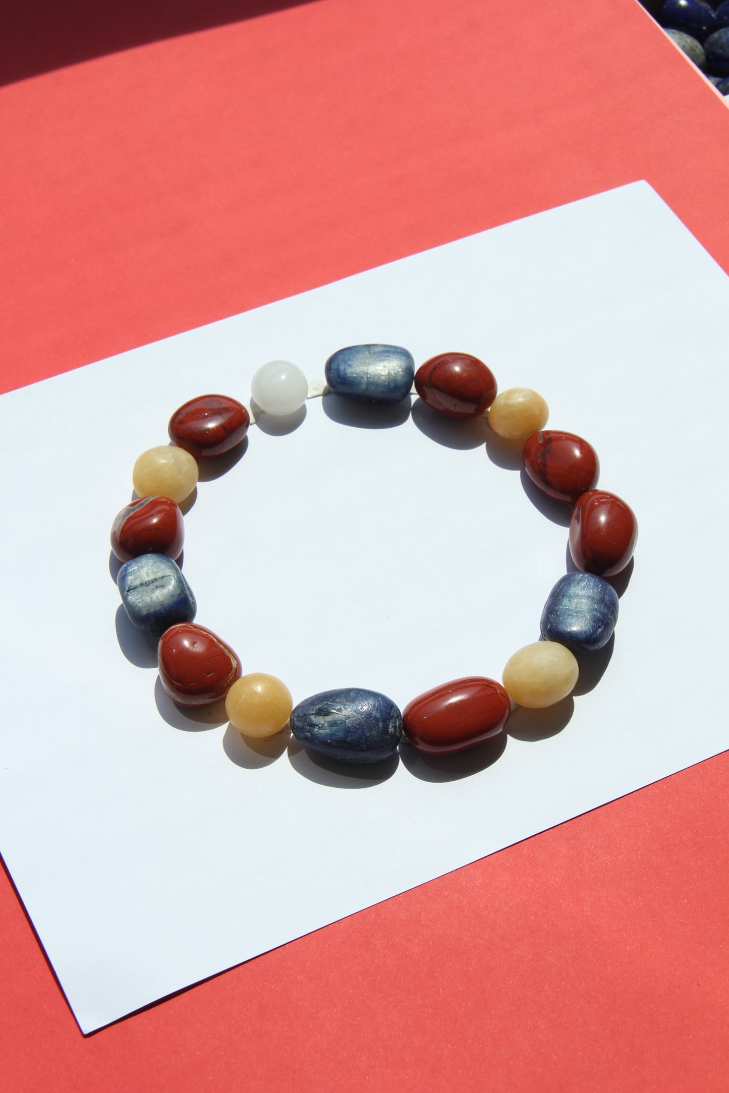 Necklace: kyanite, red jasper stone, cream yellow onyx