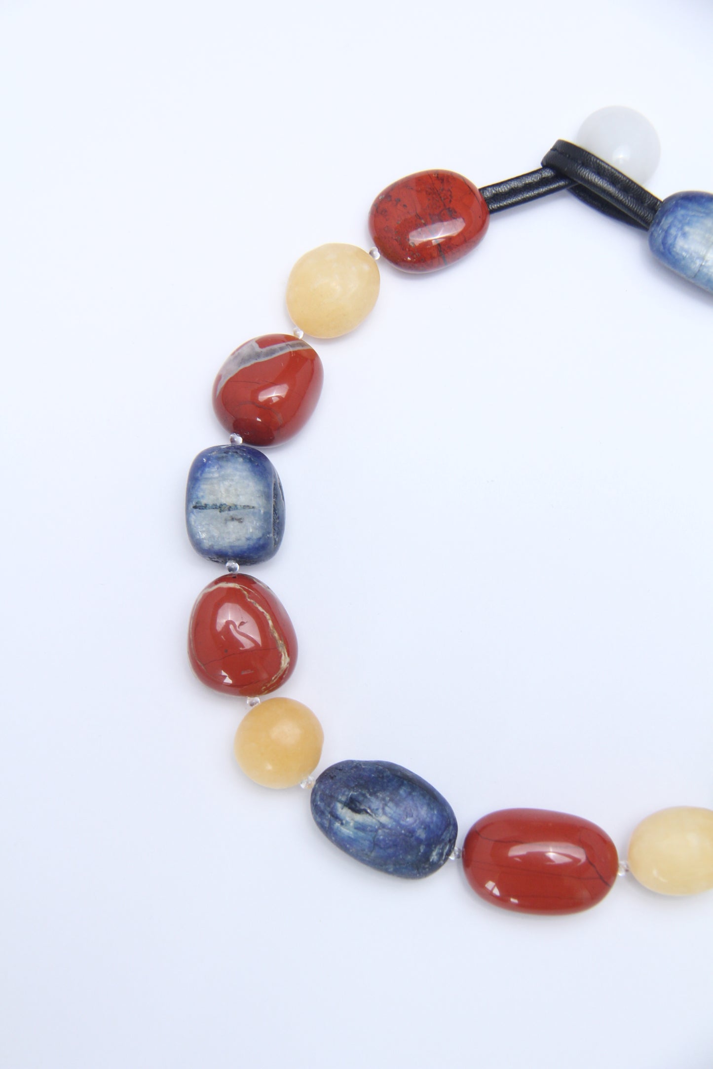 Necklace: kyanite, red jasper stone, cream yellow onyx