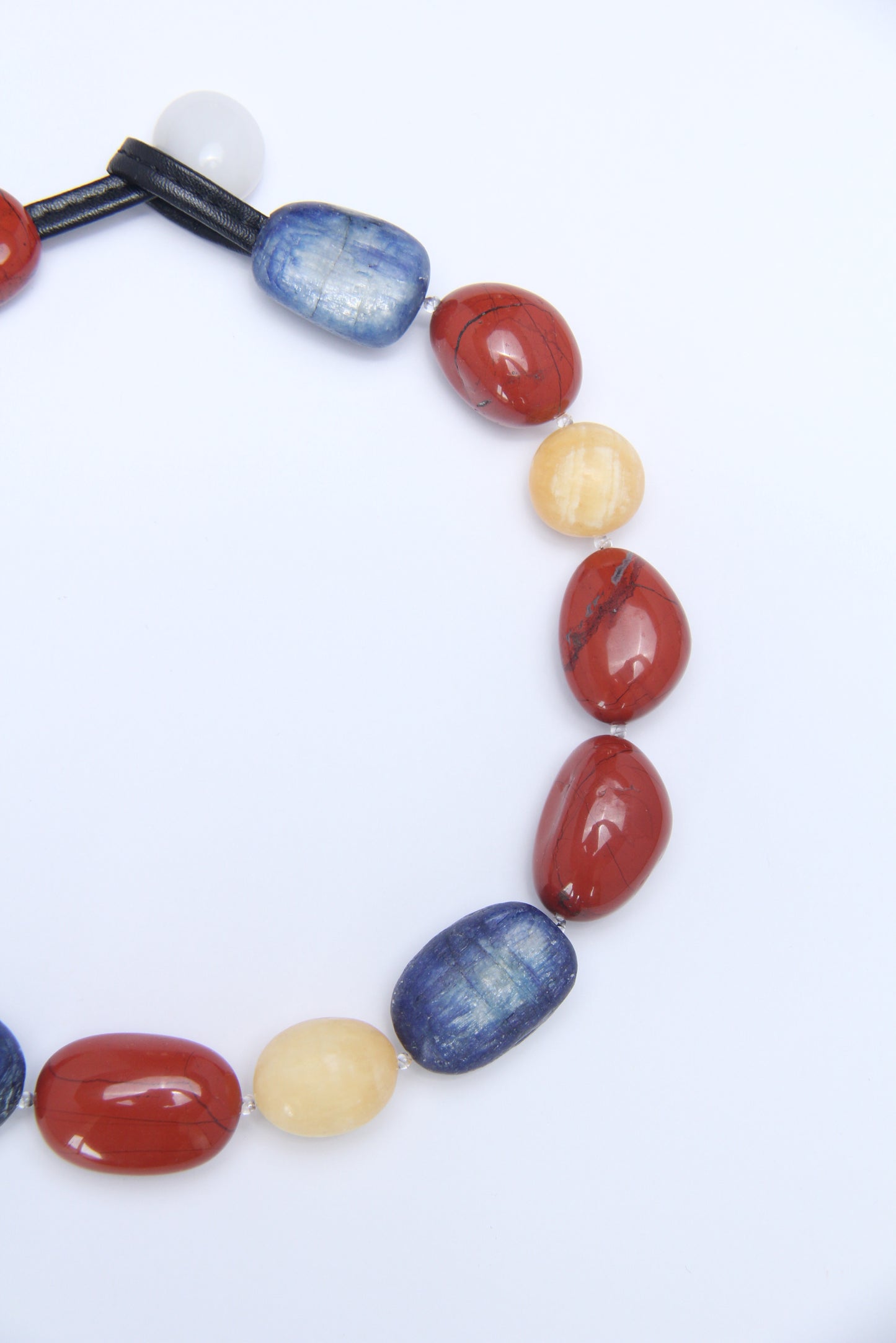 Necklace: kyanite, red jasper stone, cream yellow onyx