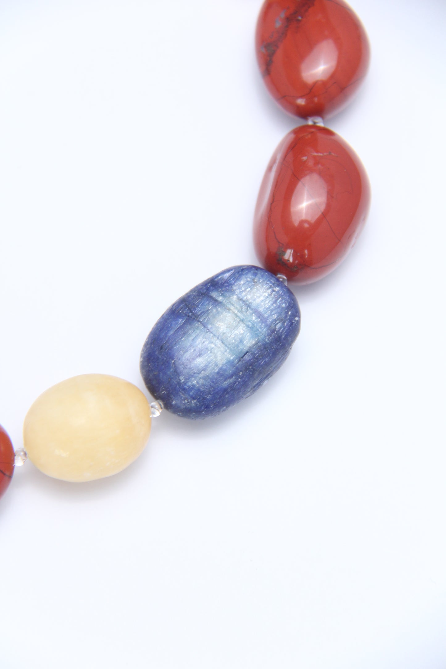 Necklace: kyanite, red jasper stone, cream yellow onyx