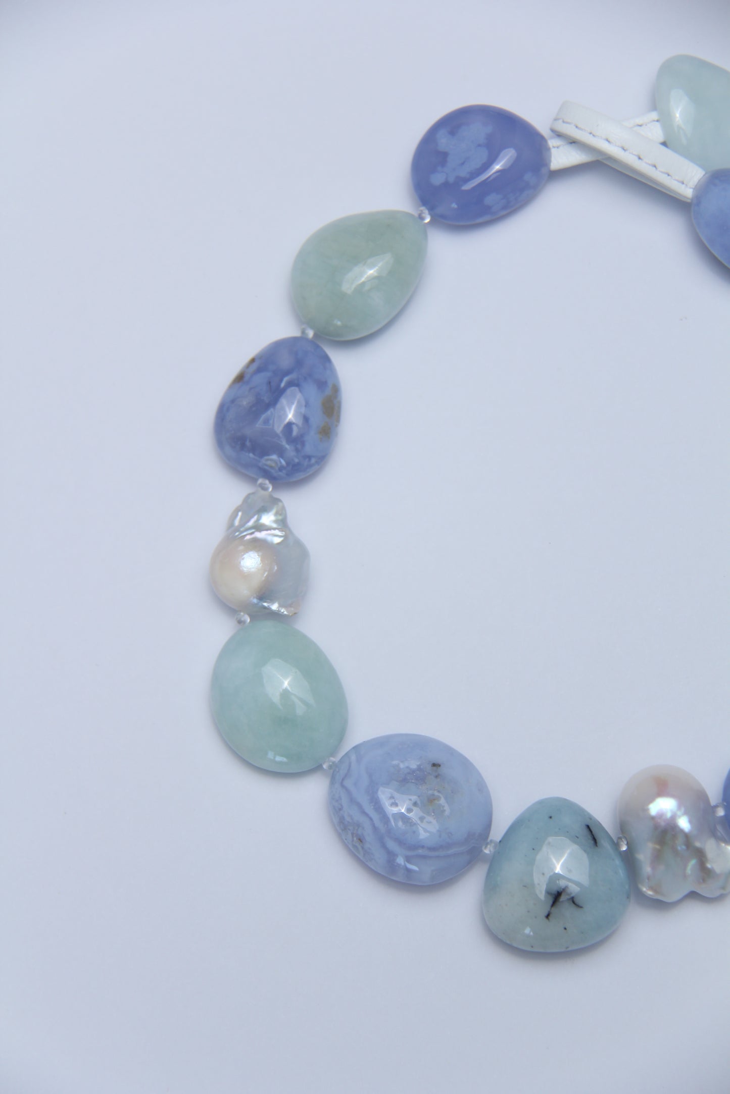 Necklace: baroque pearls, morganite, blue lace agate