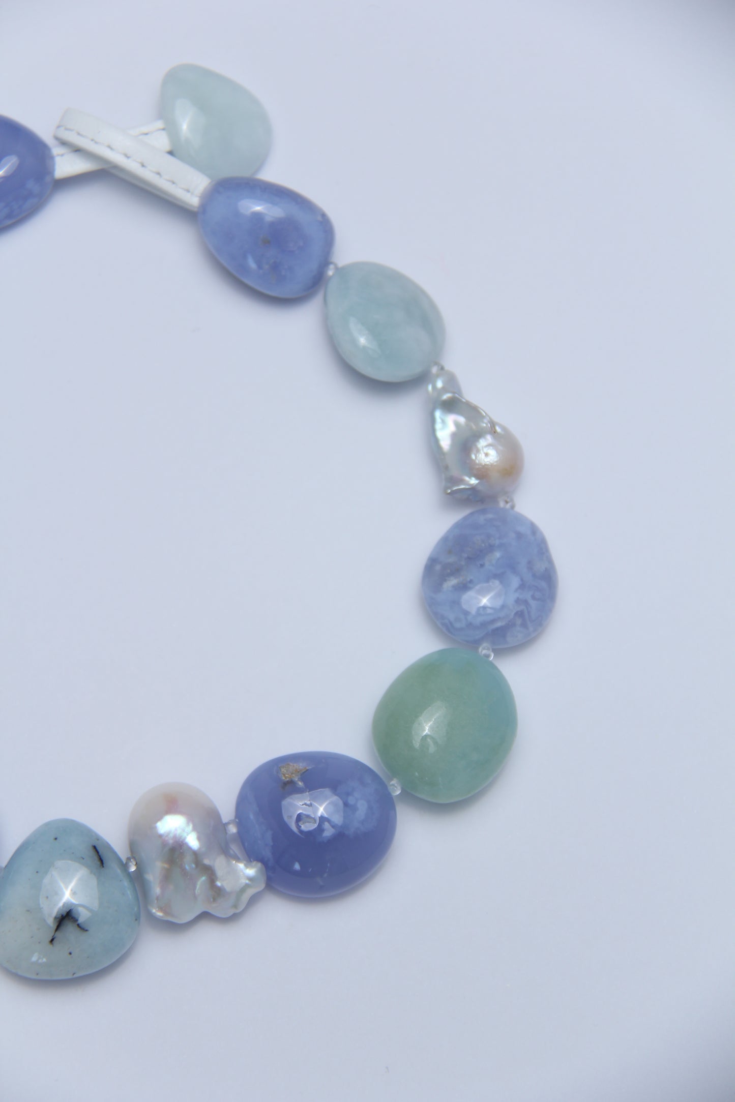 Necklace: baroque pearls, morganite, blue lace agate