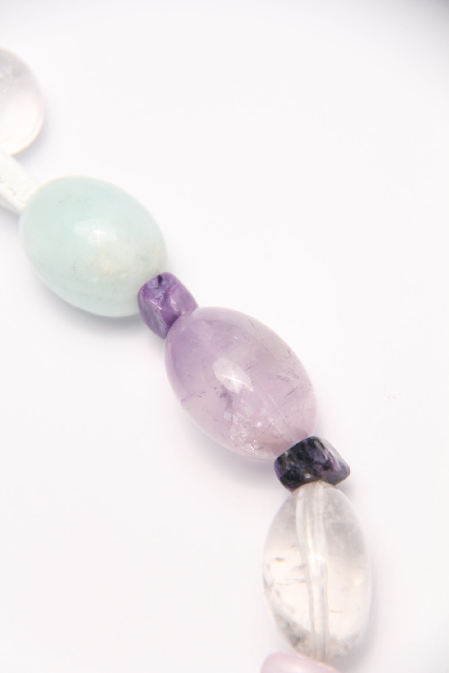 Necklace: clear quartz, aquamarine, amethyst, kunzite, charoite