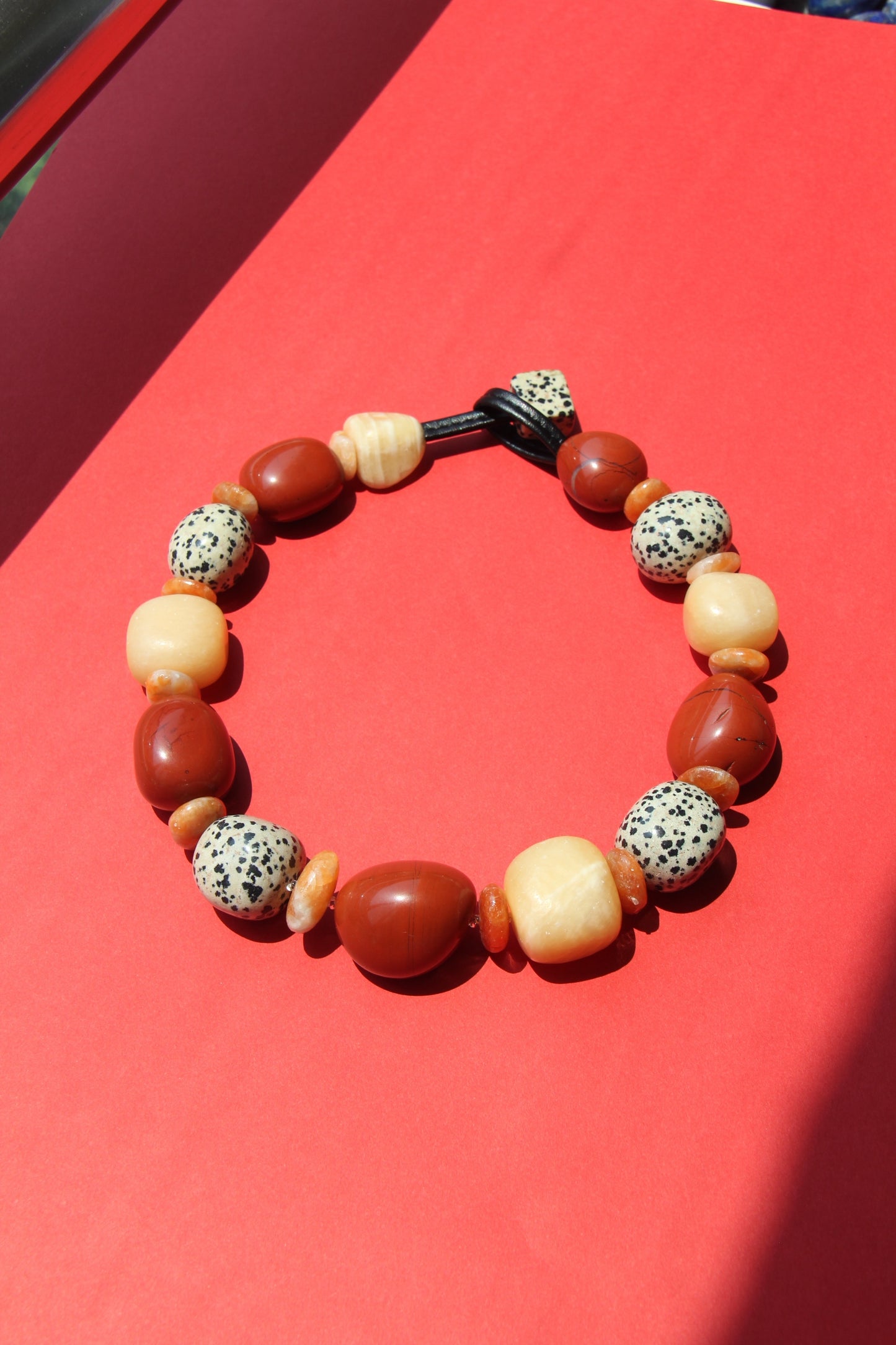 Necklace: red jasper stone, cream yellow onyx, dalmatian jasper