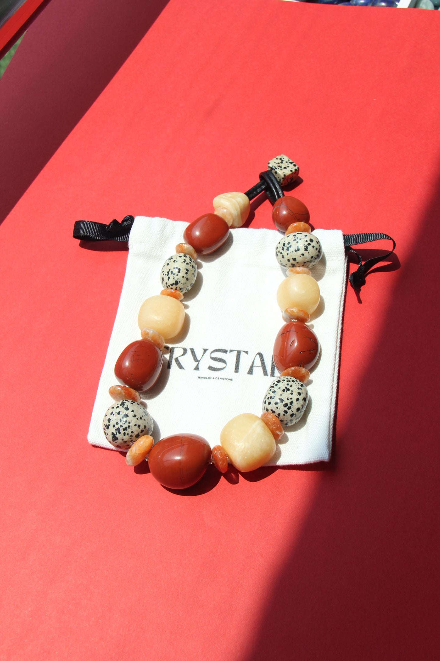 Necklace: red jasper stone, cream yellow onyx, dalmatian jasper