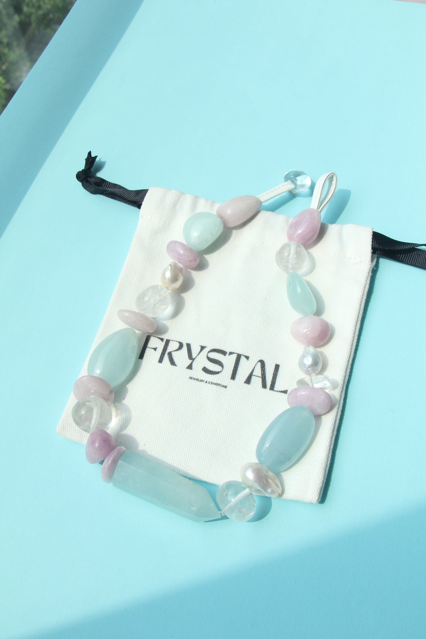 Necklace: aquamarine, kunzite, quartz, pearls