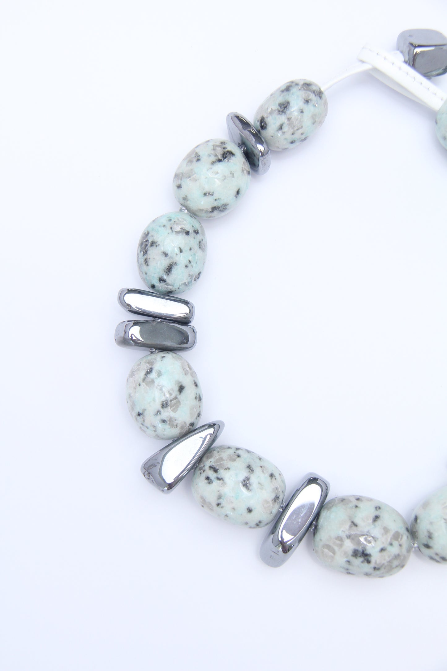 Necklace: kiwi jasper stone, titanium magnet