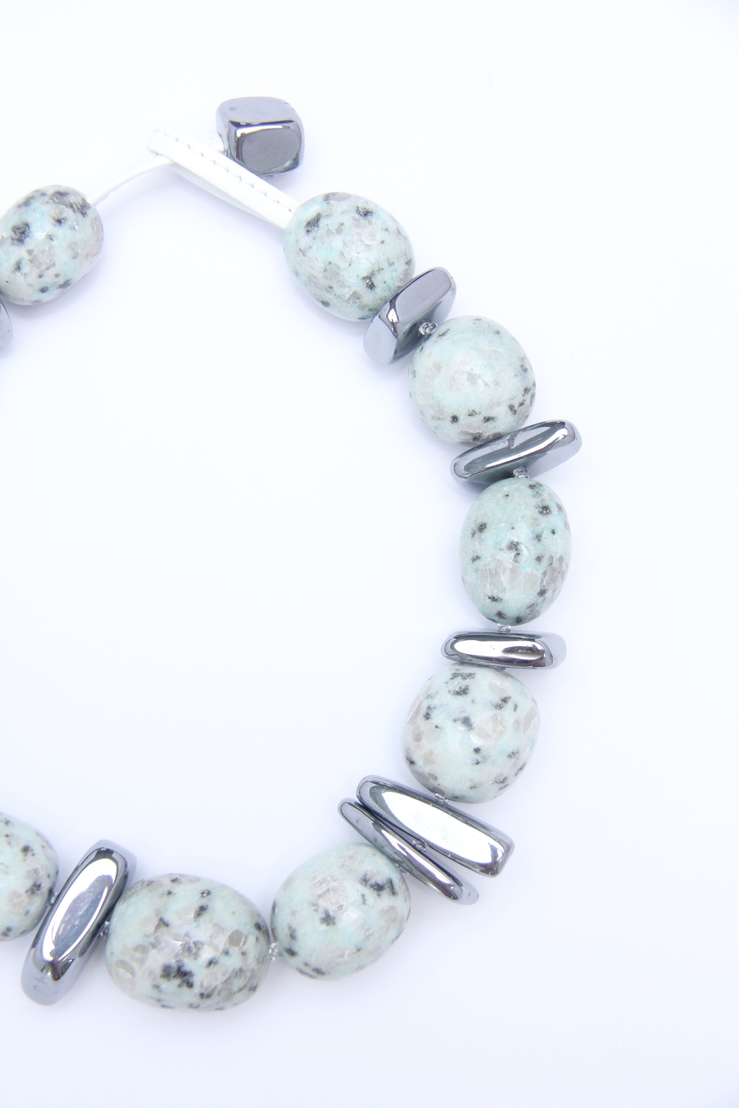 Necklace: kiwi jasper stone, titanium magnet