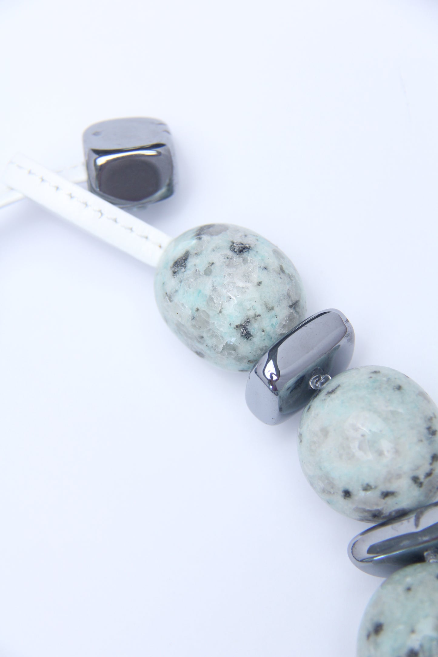 Necklace: kiwi jasper stone, titanium magnet