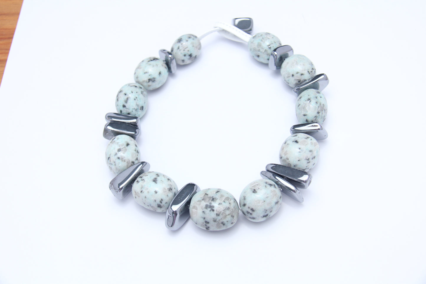 Necklace: kiwi jasper stone, titanium magnet