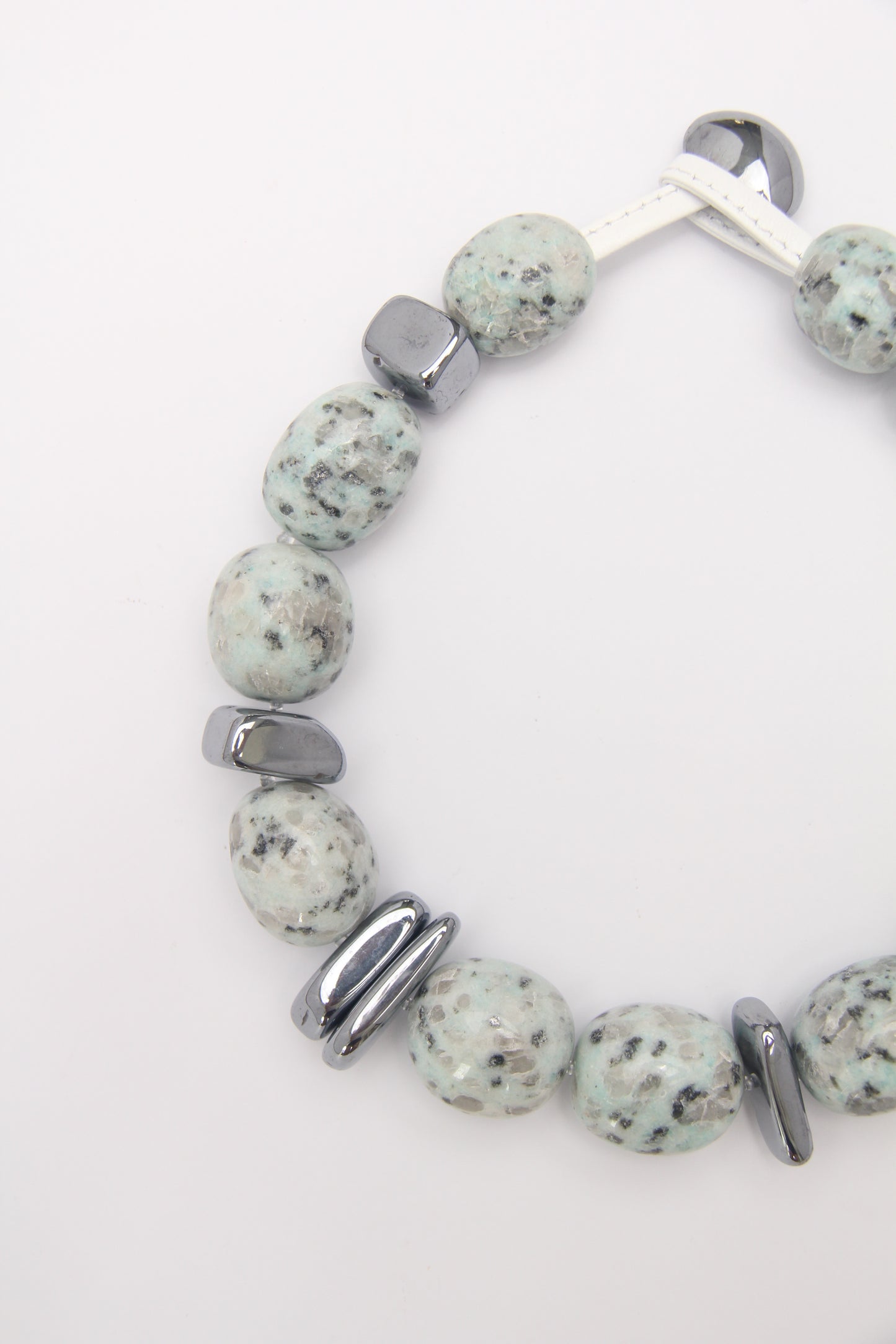 Necklace: kiwi jasper stone, titanium magnet