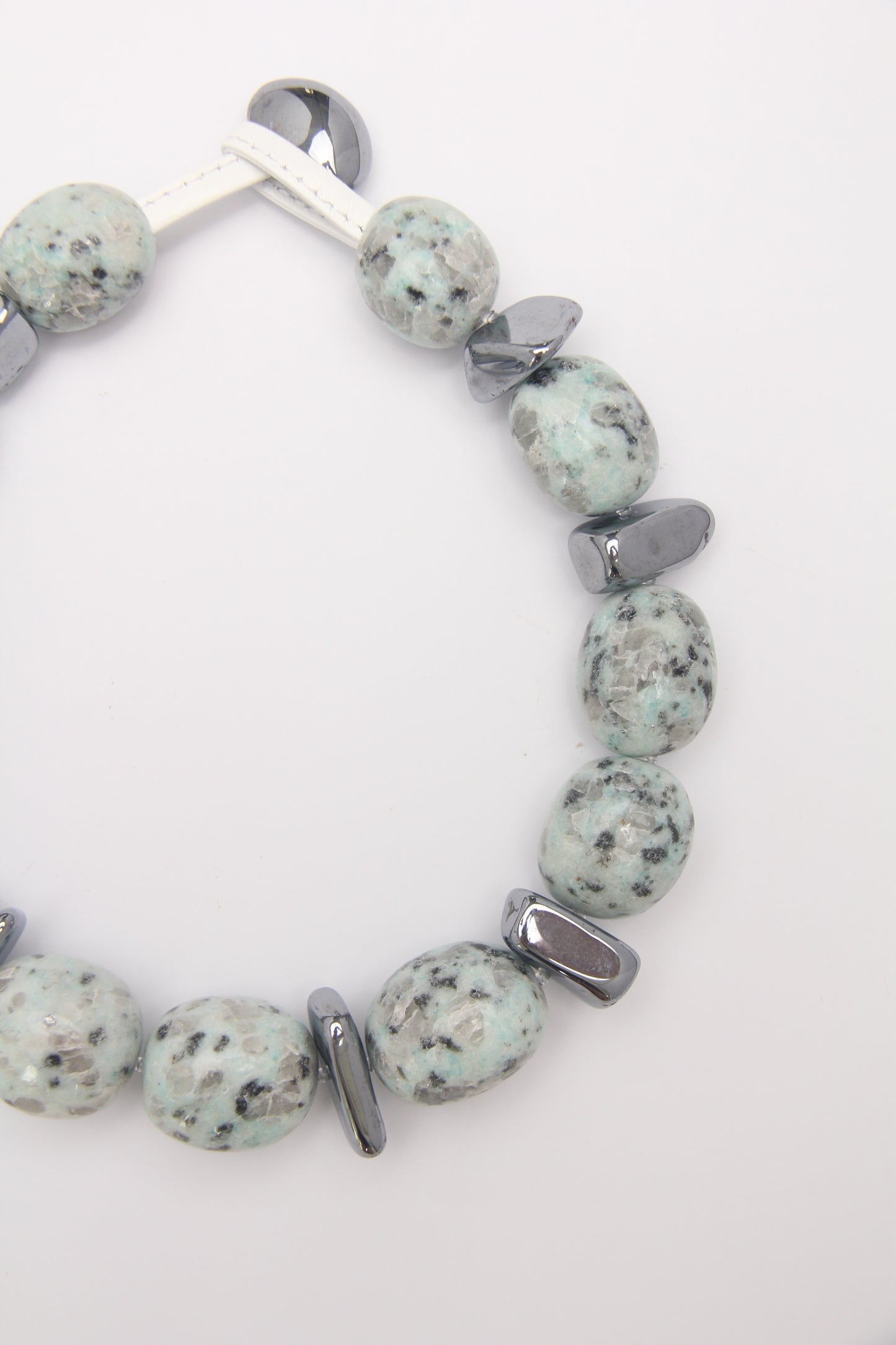 Necklace: kiwi jasper stone, titanium magnet