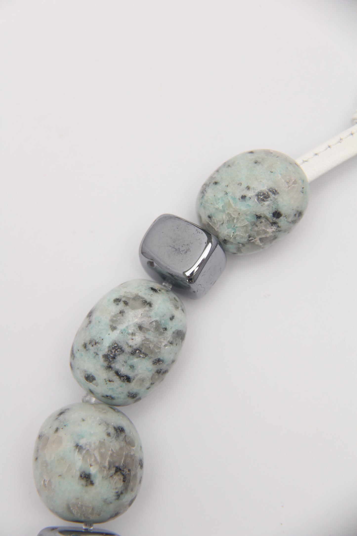 Necklace: kiwi jasper stone, titanium magnet